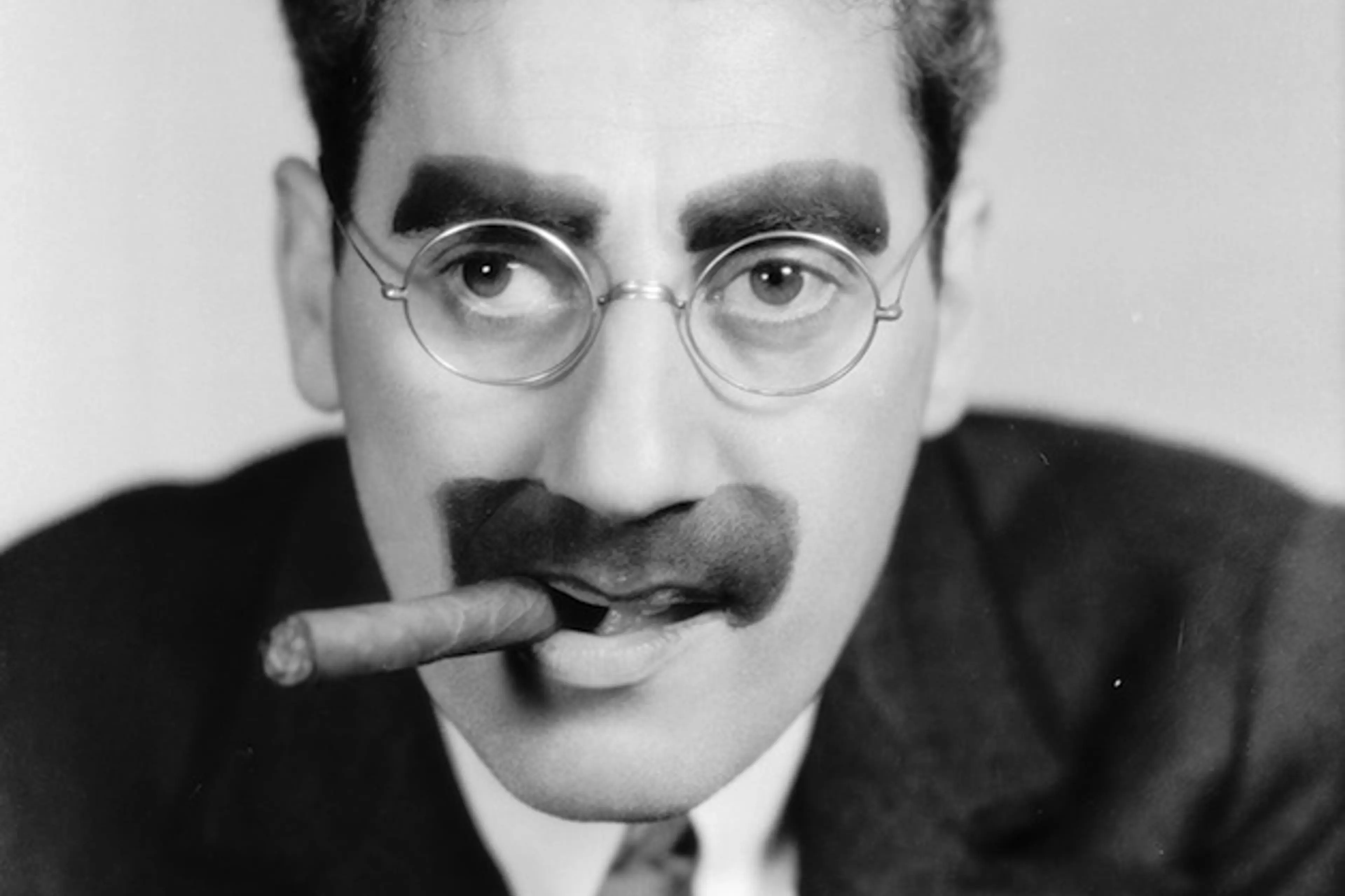edgar is being asked to try tobacco Allan Poe Groucho Marx at 125: Remembering