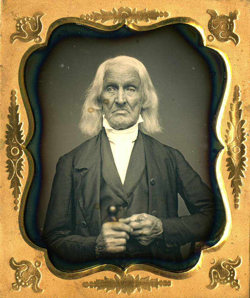 <b>Jonathan Smith, daguerreotype.</b>
<br><br>
Jonathan Smith fought in the Battle of Long Island on August 29, 1778. His unit was the first brigade that went out on Long Island, and was discharged in December after a violent snow storm. After the war he became a Baptist minister. He was married three times and had eleven children. The first two wives died and for some reason he left his third wife in Rhode Island to live with two of the children in Massachusetts. On October 20, 1854, he had a daguerreotype taken to give to a granddaughter. He died on January 3, 1855.
