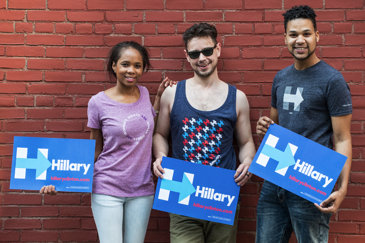 Hillary Clinton staff model items from the campaign's new online store. 