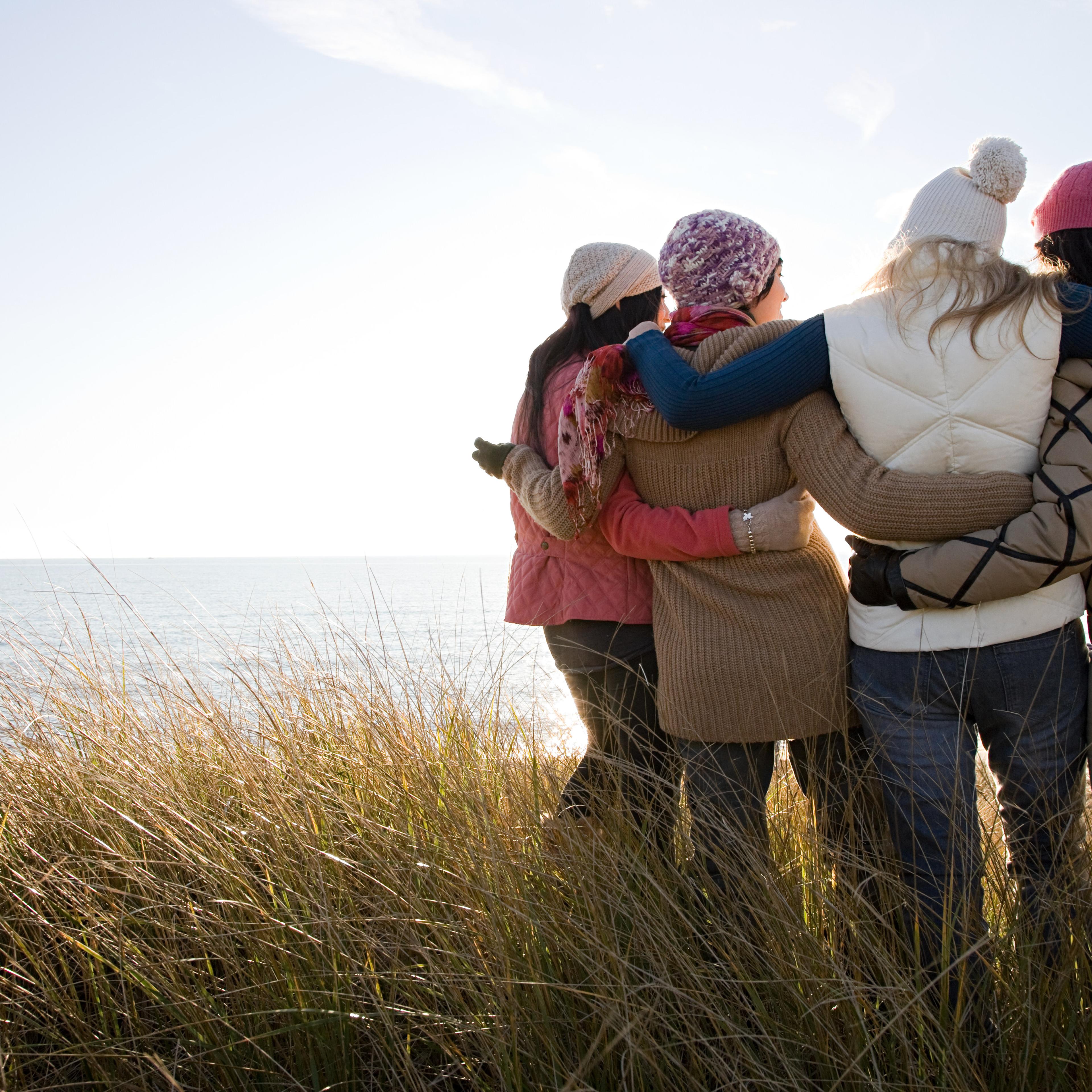 Female friends by the sea