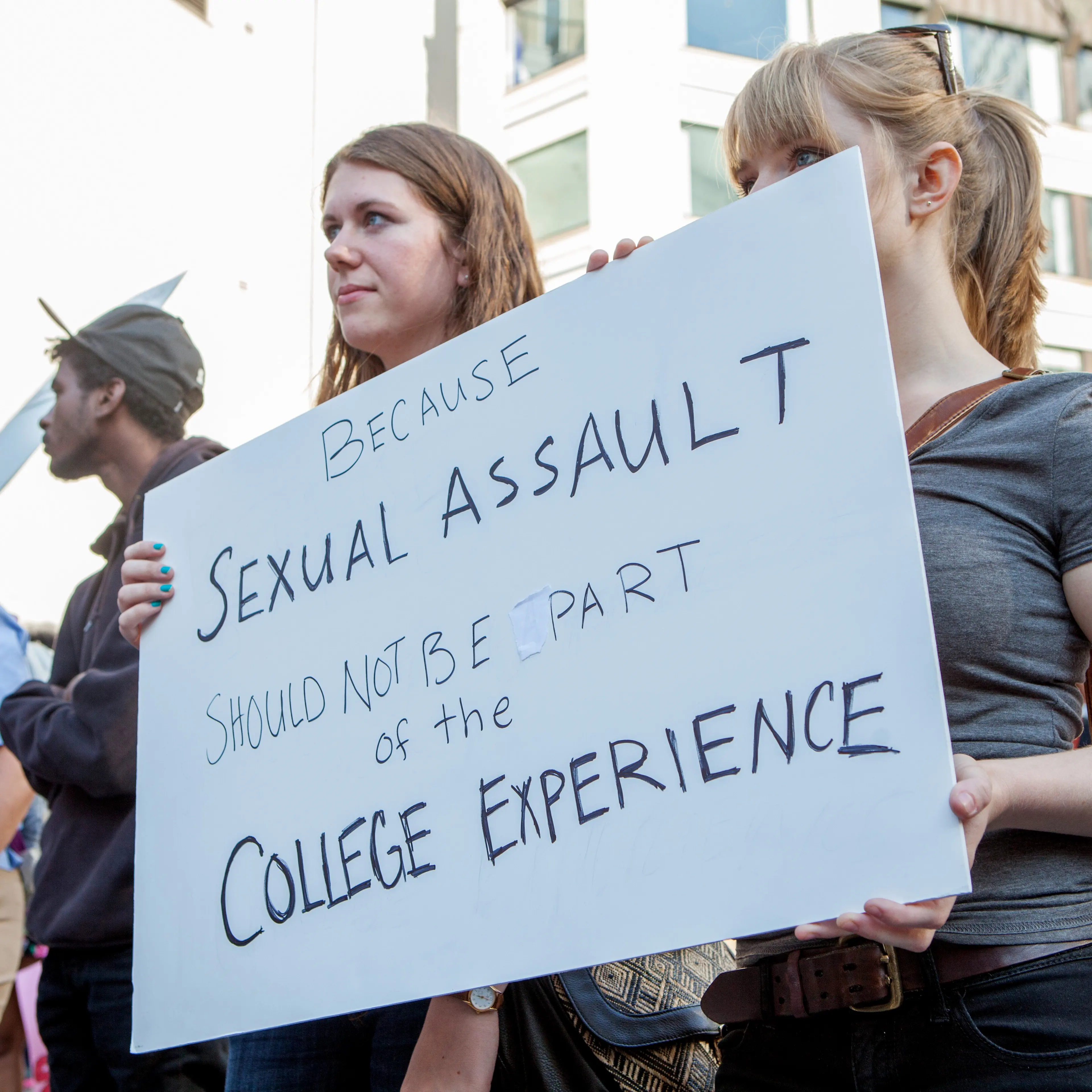 Demonstrators protest sexual assault on college campuses at the #YesAllWomen rally in solidarity with those affected by violence in Seattle on May 30, 2014.