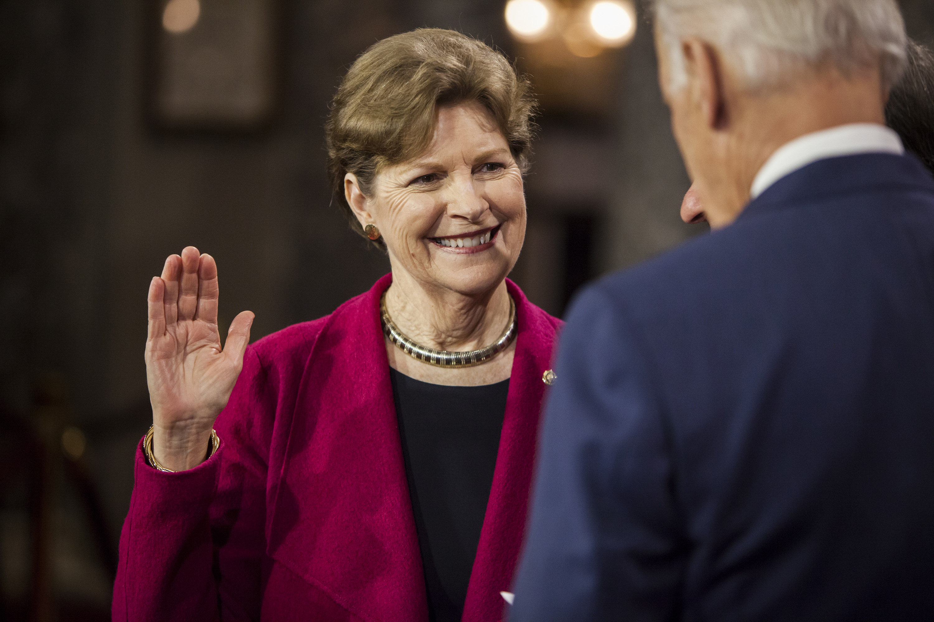 Senator Jeanne Shaheen reenacts her swearing in to the 114th U.S. Congress with Vice President Joe Biden in Washington, D.C. on January 6, 2015.