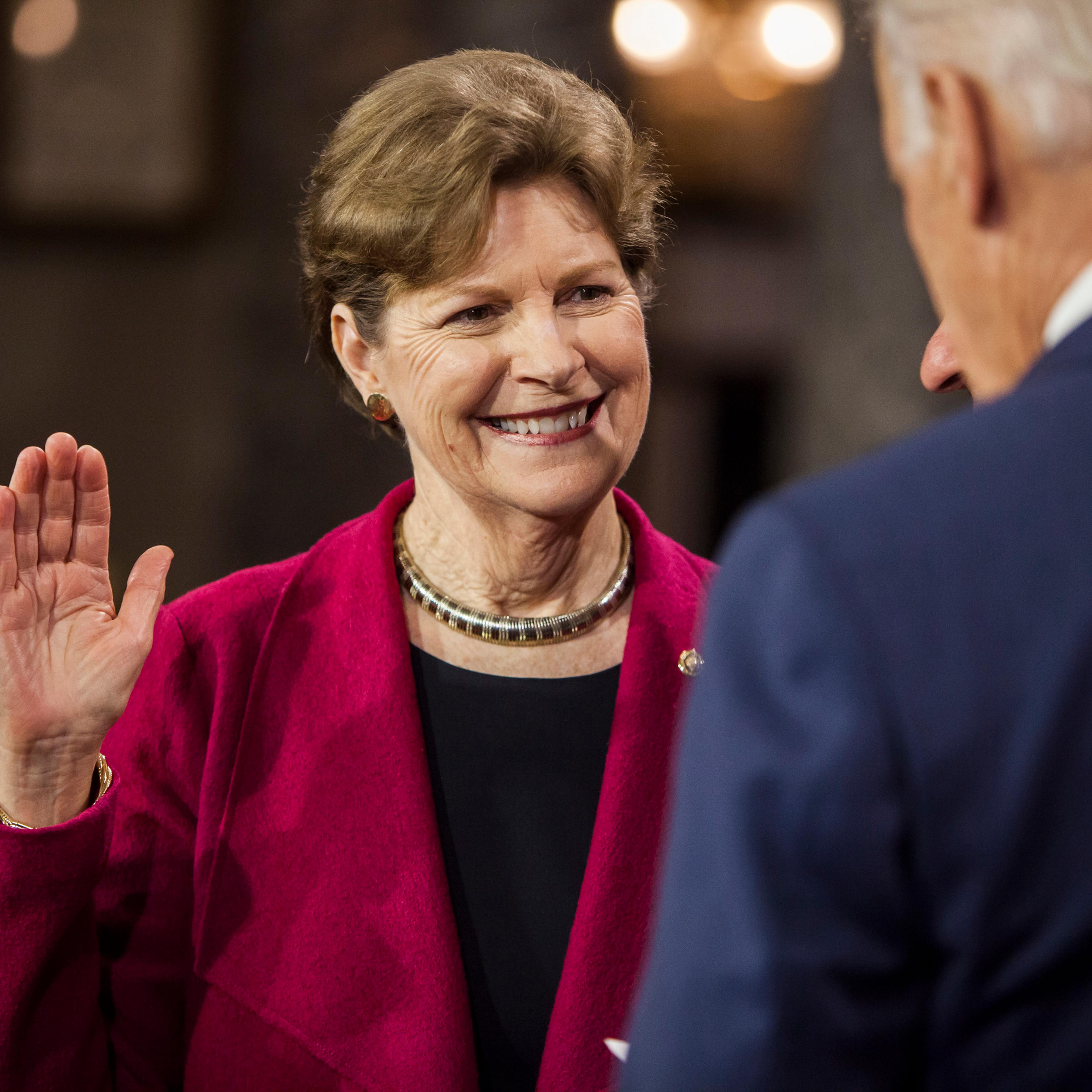 Senator Jeanne Shaheen reenacts her swearing in to the 114th U.S. Congress with Vice President Joe Biden in Washington, D.C. on January 6, 2015.