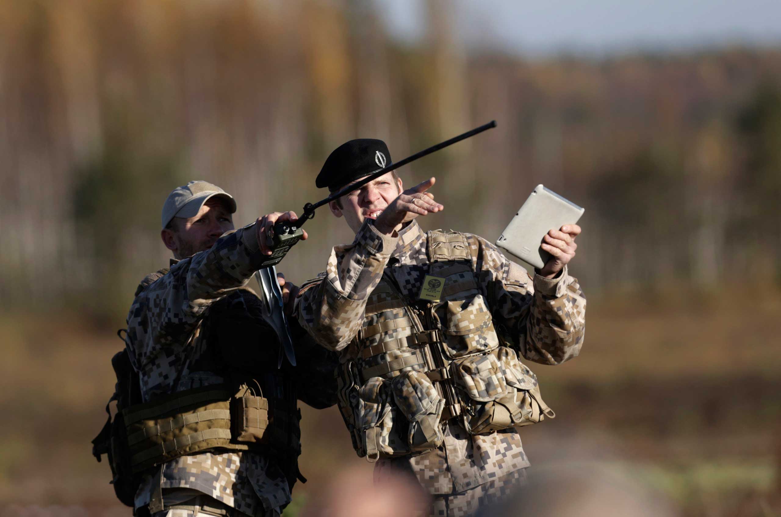 Soldiers from the Latvian army participate in the Silver Arrow NATO military exercise in Adazi, Latvia, Oct. 5, 2014.