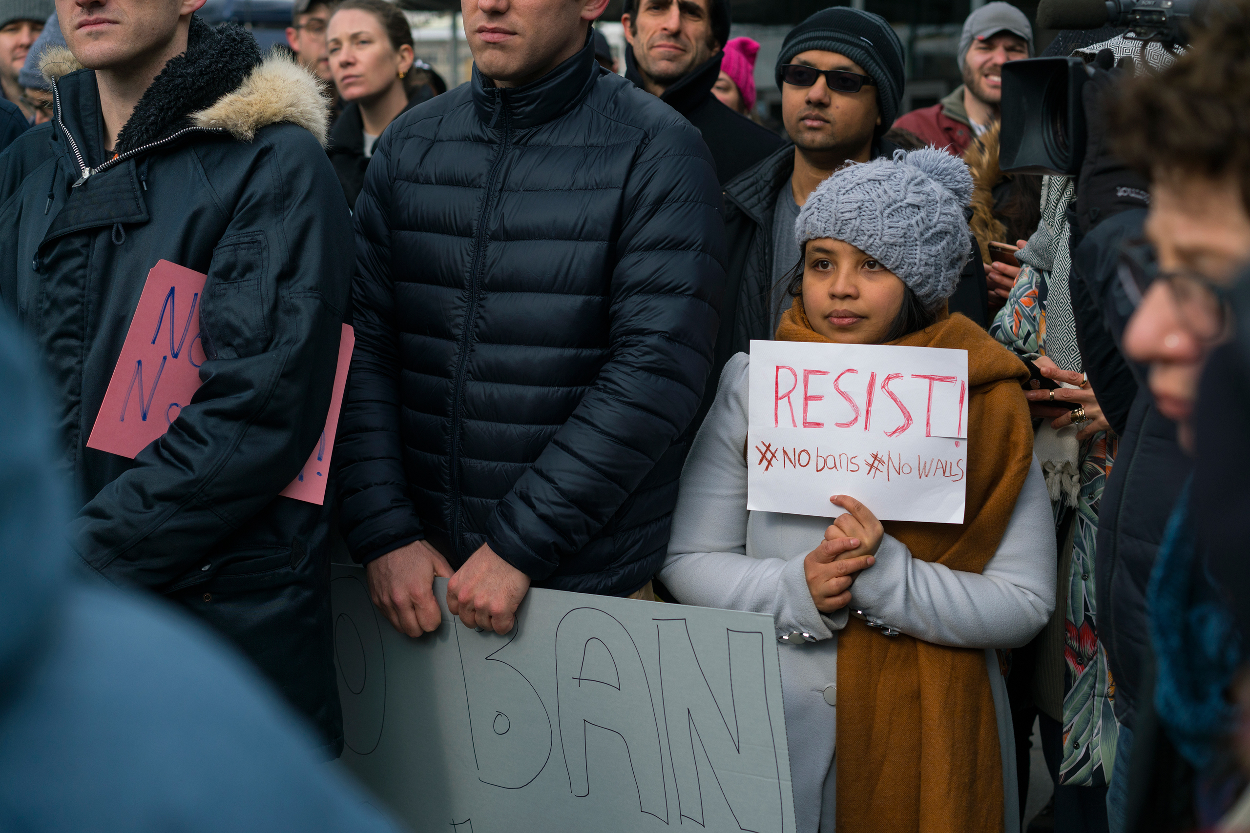 Protesters assemble at John F. Kennedy International Airport in New York, Saturday, Jan. 28, 2017 after two Iraqi refugees were detained while trying to enter the country. On Friday, Jan. 27, President Donald Trump signed an executive order suspending al