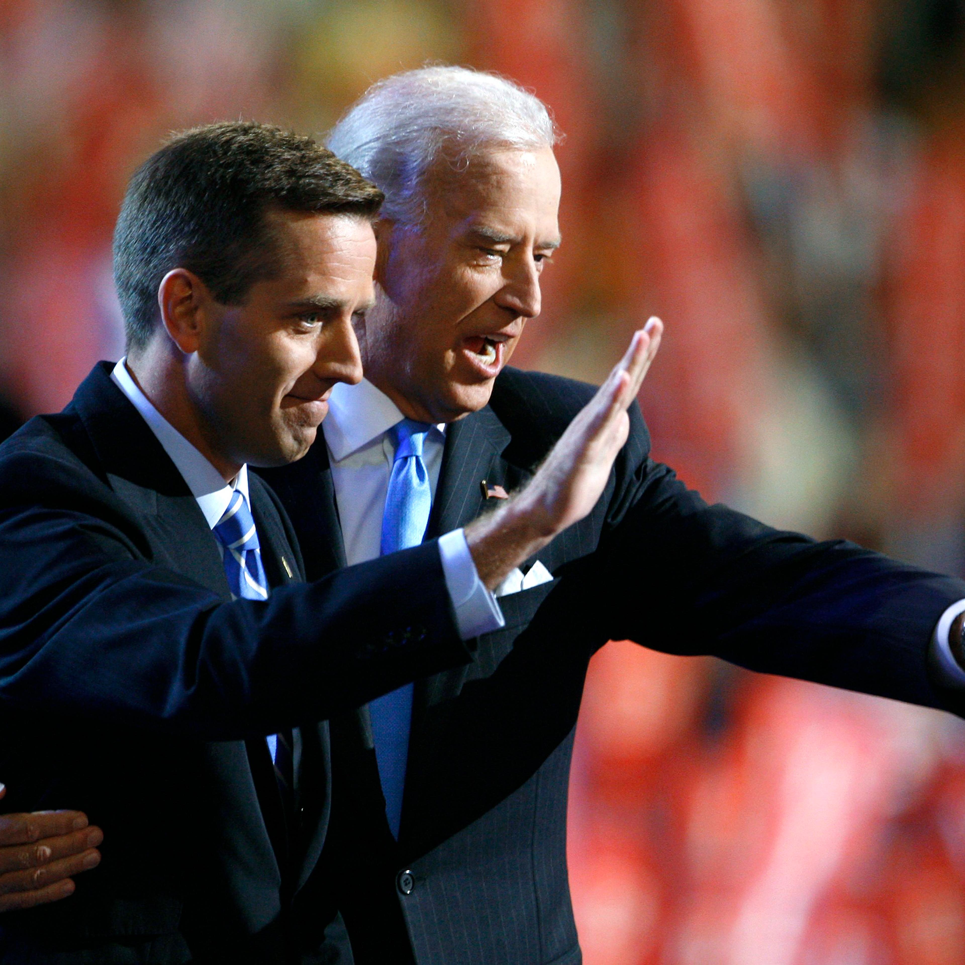 Attorney General Beau and Vice Presidential candidate Senator Biden gesture on stage at the 2008 Democratic National Convention in Denver