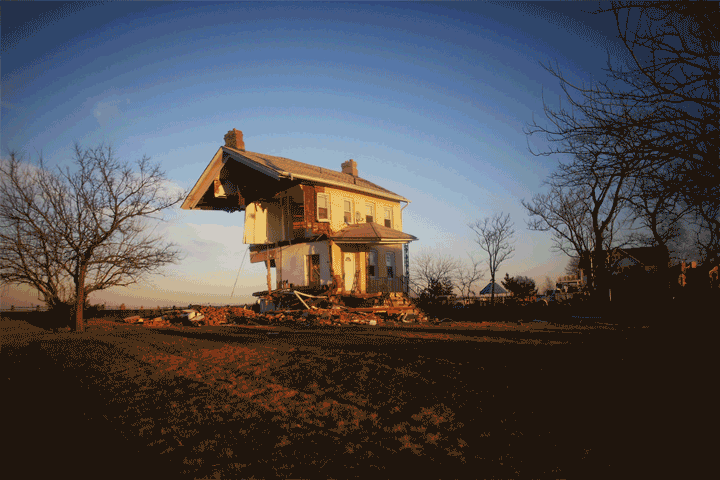 Before: The iconic Princess Cottage, built in 1855, after being ravaged by Sandy on November 21, 2012 in Union Beach, New Jersey. After: The spot where the Princess Cottage used to be on October 22, 2013.