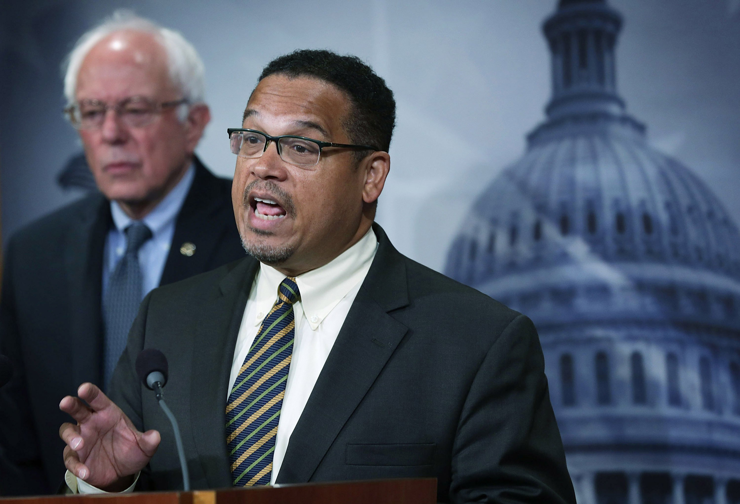 WASHINGTON, DC - SEPTEMBER 17: U.S. Sen. Bernie Sanders (I-VT) (L) and Rep. Keith Ellison (D-MN) (R) speak to members of the media during a news conference about private prisons September 17, 2015 on Capitol Hill in Washington, DC. The legislators announ
