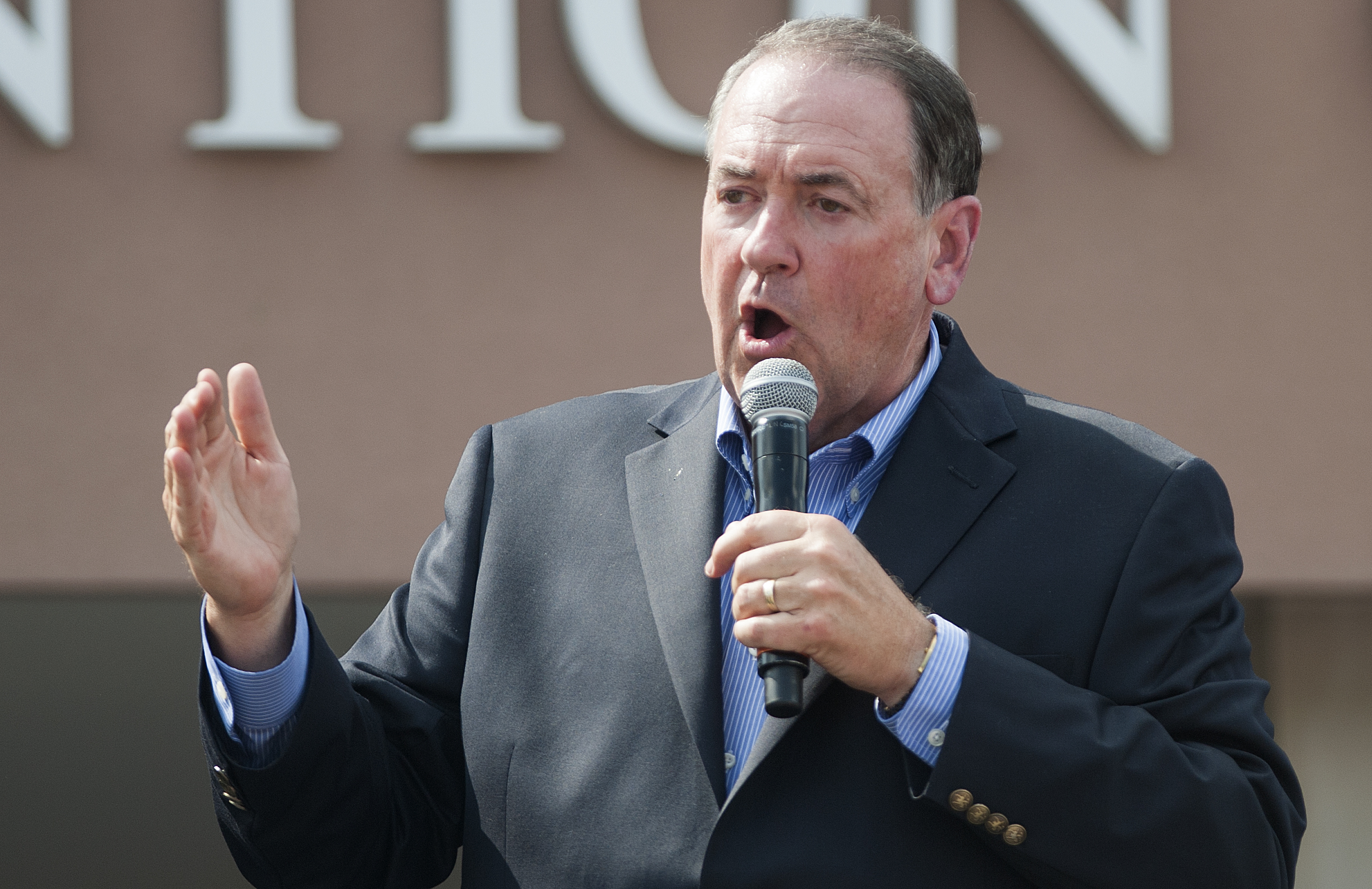 Republican presidential candidate Mike Huckabee speaks to supporters during a rally for County Clerk Kim Davis in front of the Carter County Detention Center n Grayson, Kentucky, on Sept. 8, 2015.
