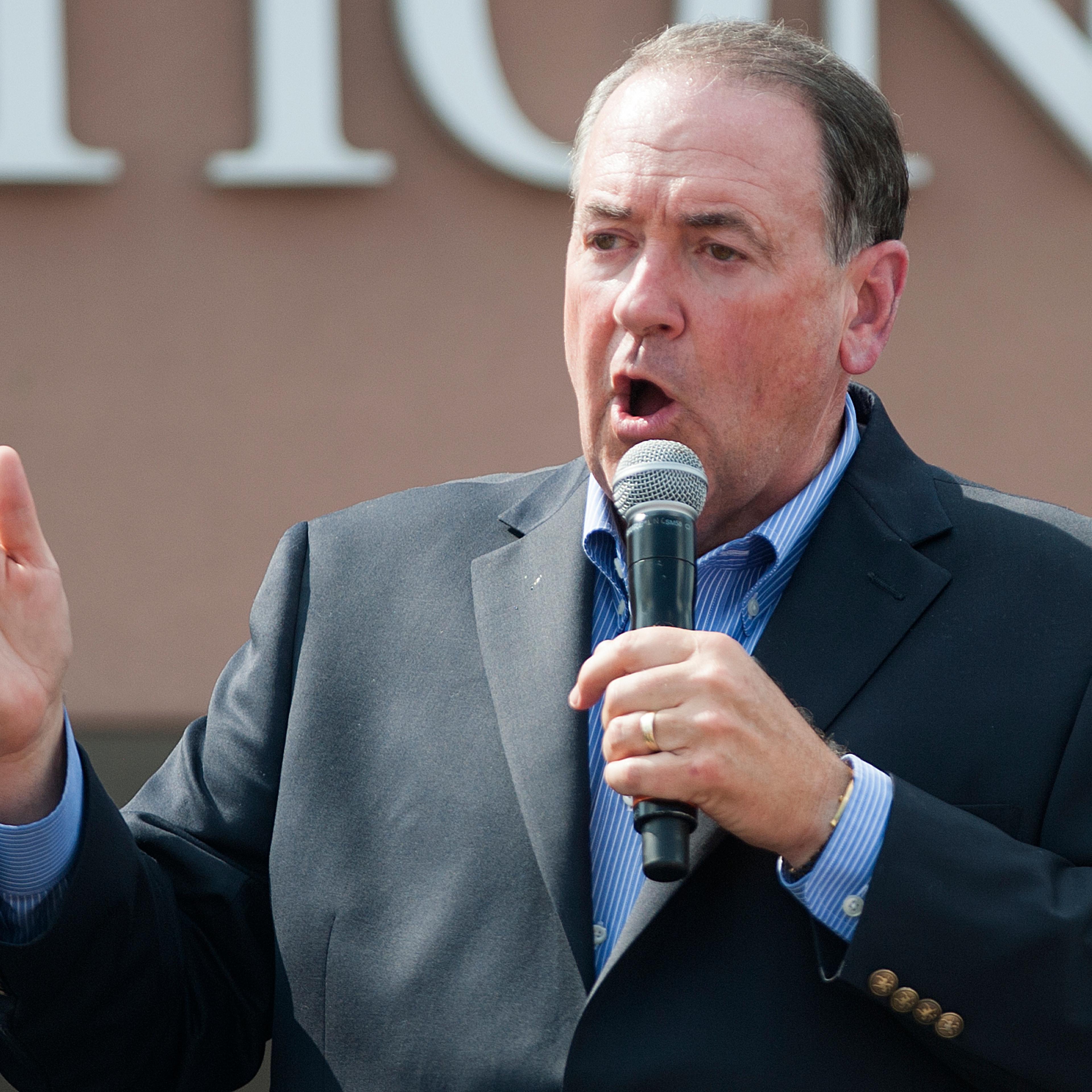 Republican presidential candidate Mike Huckabee speaks to supporters during a rally for County Clerk Kim Davis in front of the Carter County Detention Center n Grayson, Kentucky, on Sept. 8, 2015.