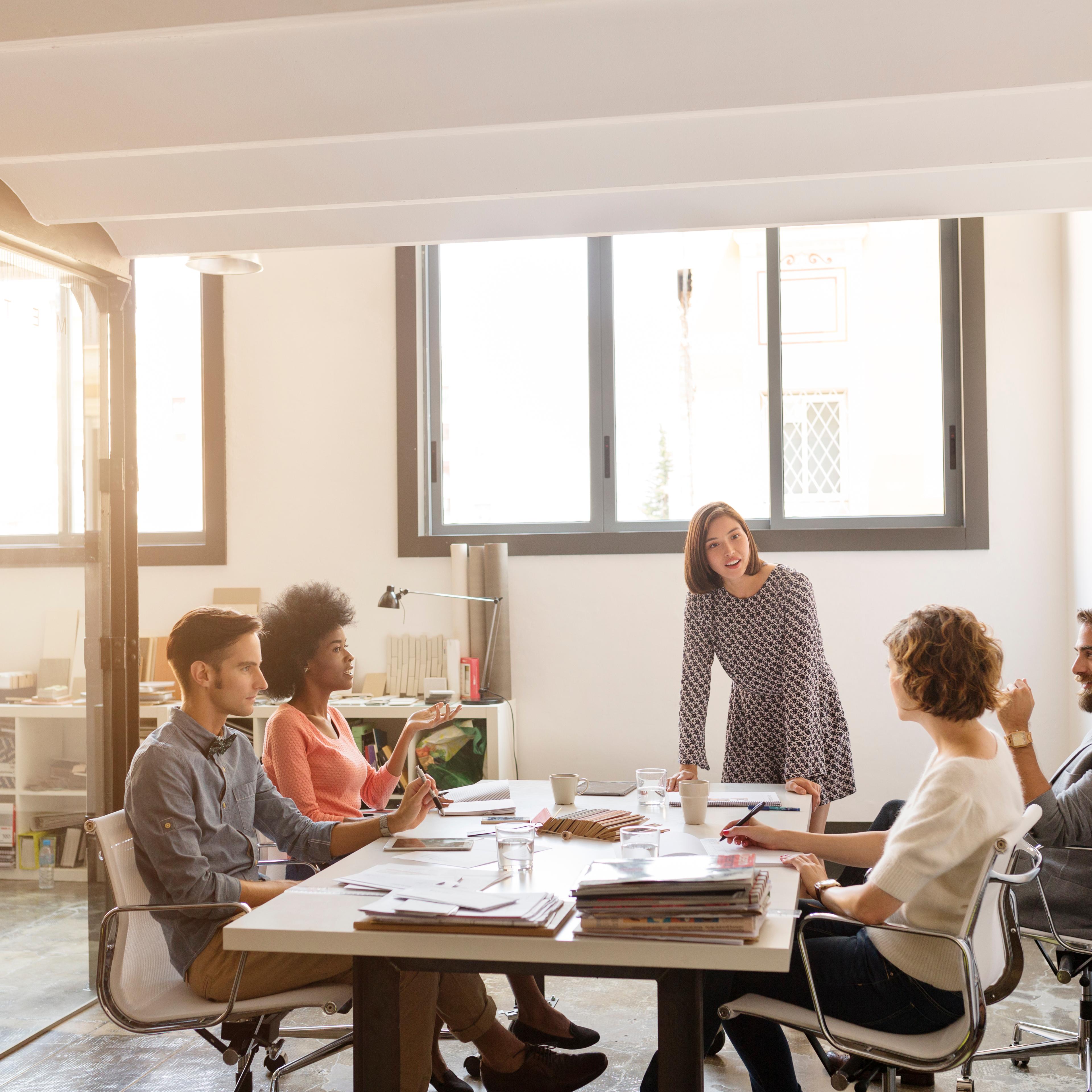 Business people discussing in board room