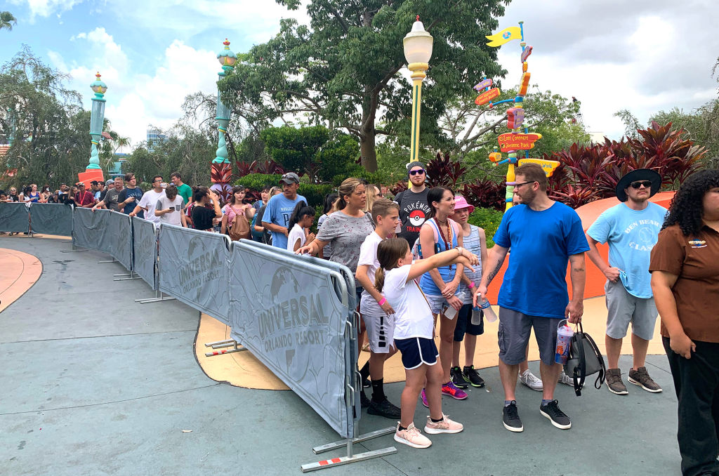 Harry Potter fans waiting in line to ride new Hagrid coaster