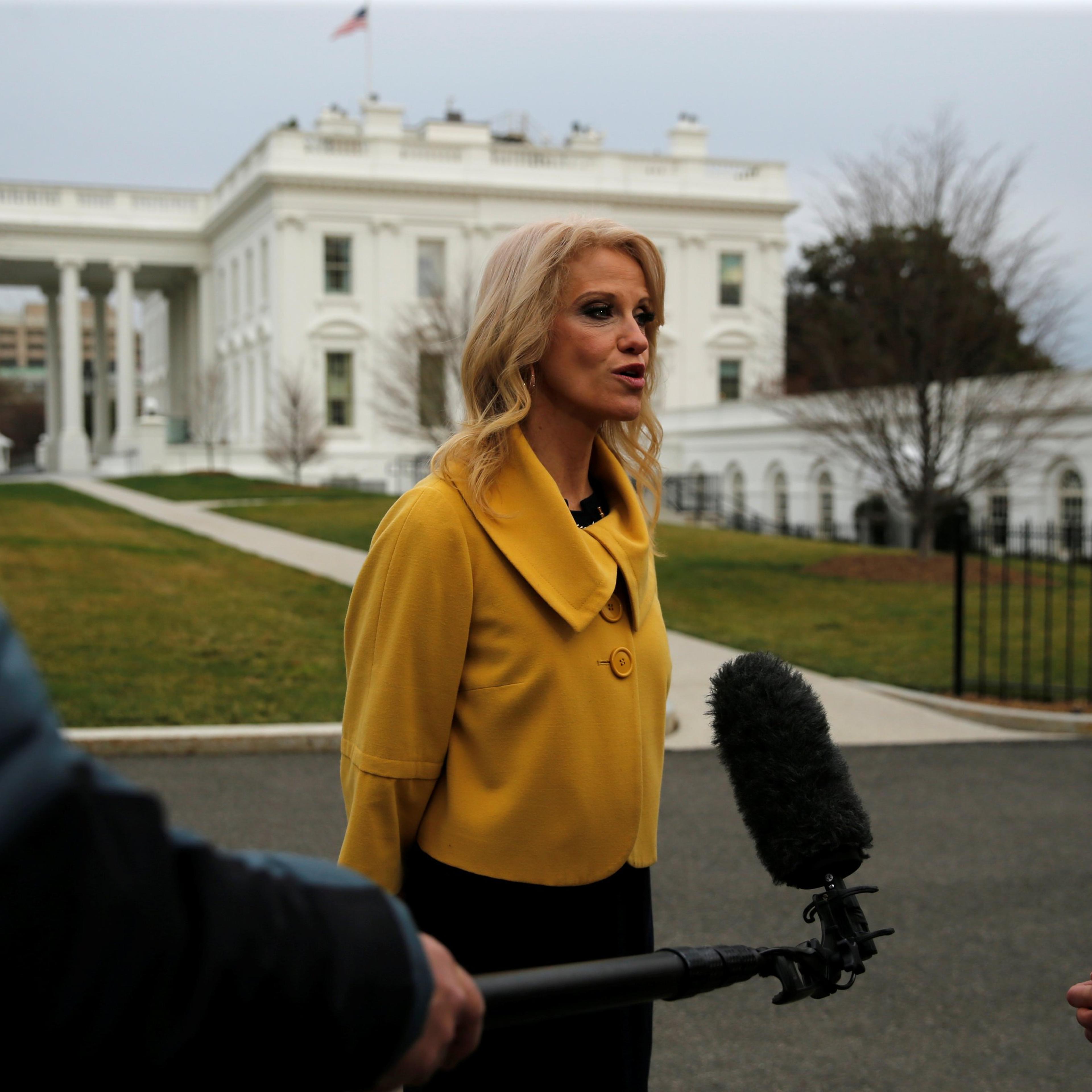 Conway delivers a television interview outside the West Wing of the White House in Washington