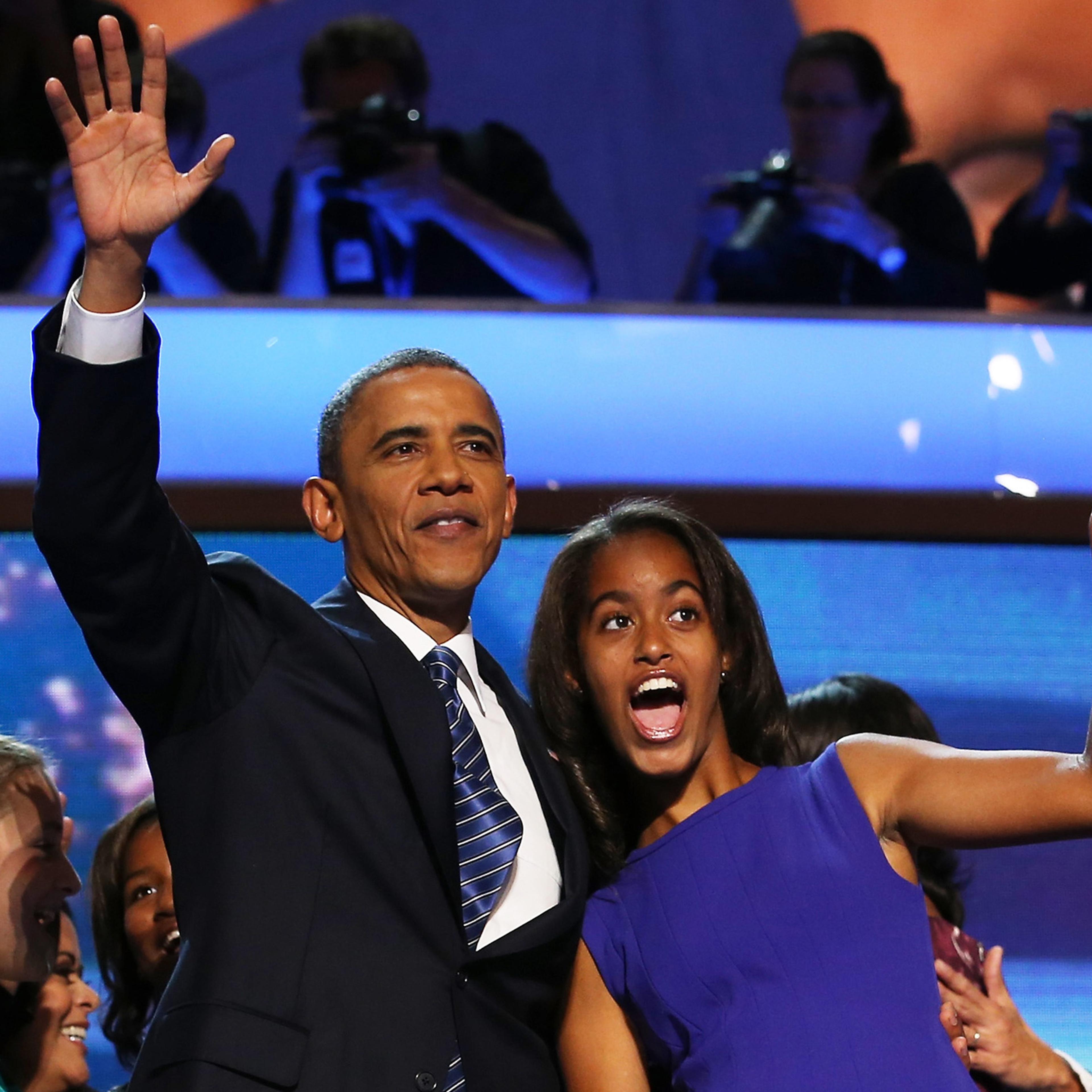 Sept. 6, 2012 President Barack Obama waves on stage with daughter Malia Obama after accepting the nomination during the final day of the Democratic National Convention at Time Warner Cable Arena in Charlotte, N.C.