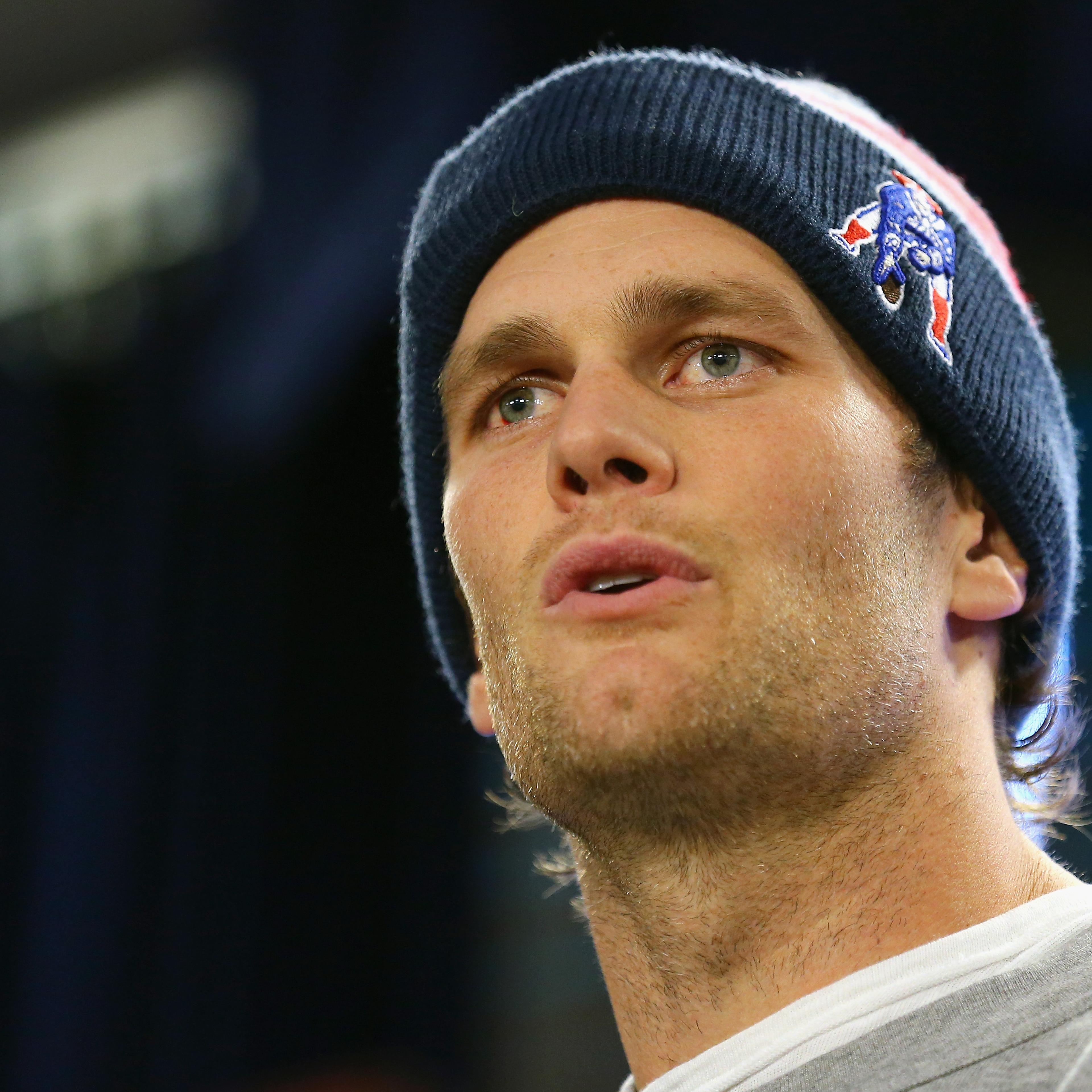 New England Patriots quarterback Tom Brady talks to the media during a press conference to address the under inflation of footballs used in the AFC championship game at Gillette Stadium on Jan. 22, 2015 in Foxboro, Mass.