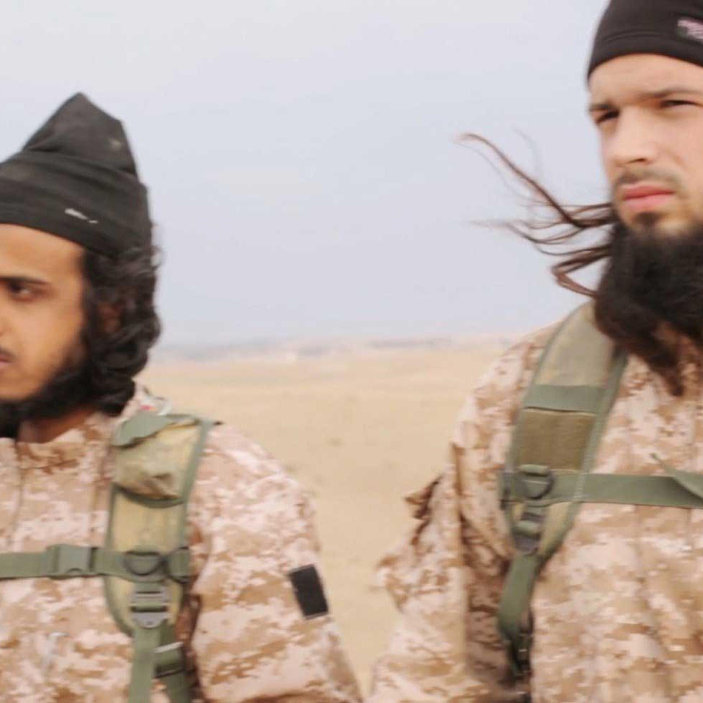 An image grab from a propaganda video released on Nov. 16, 2014 shows members of The Islamic State in Iraq and Syria, with among them a jihadist believed to be French citizen Maxime Hauchard, also known as Abu Abdallah al-Faransi, before taking part in t