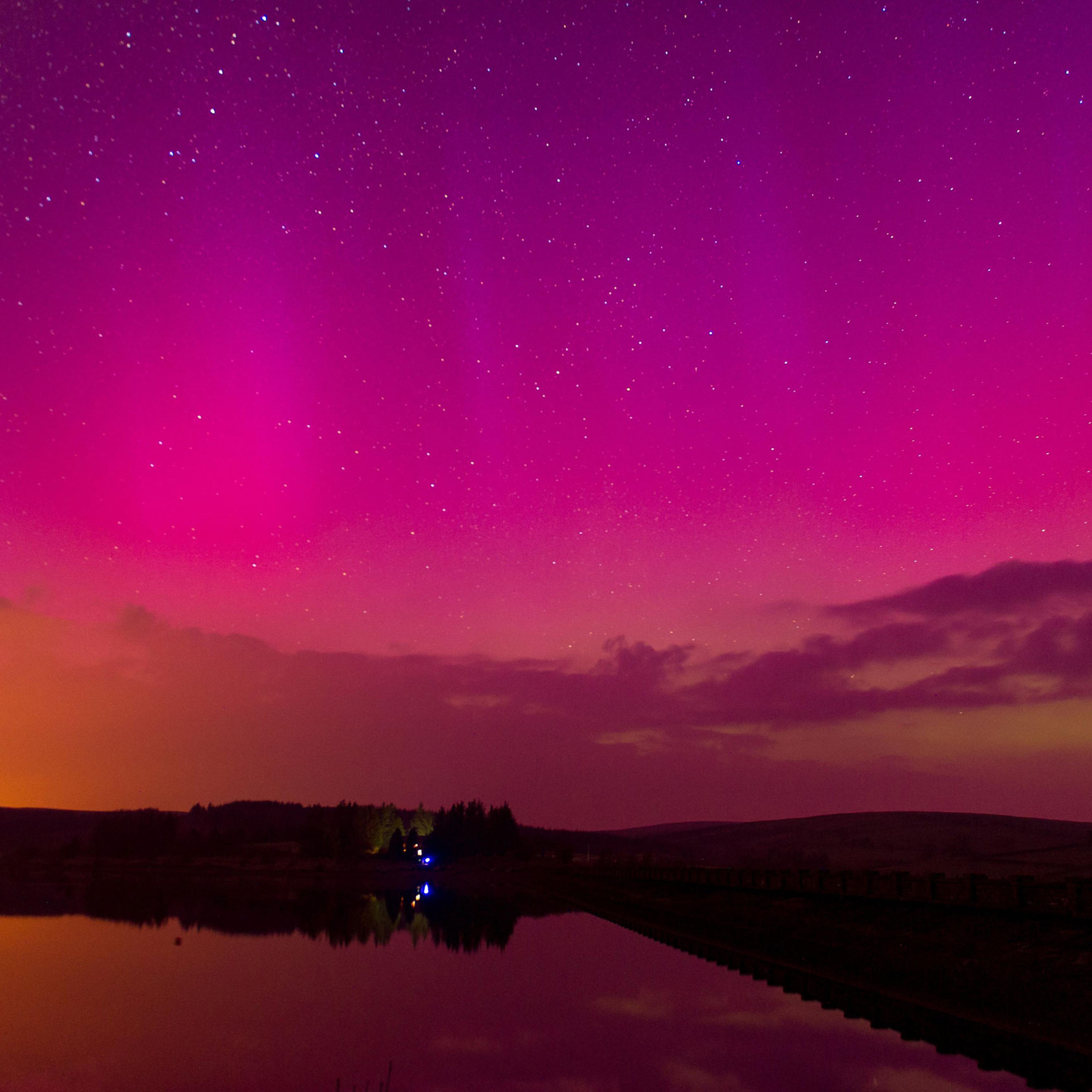 The Northern Lights are seen over Usk Reservoir at the Brecon Beacons, Wales, on March 17, 2015.