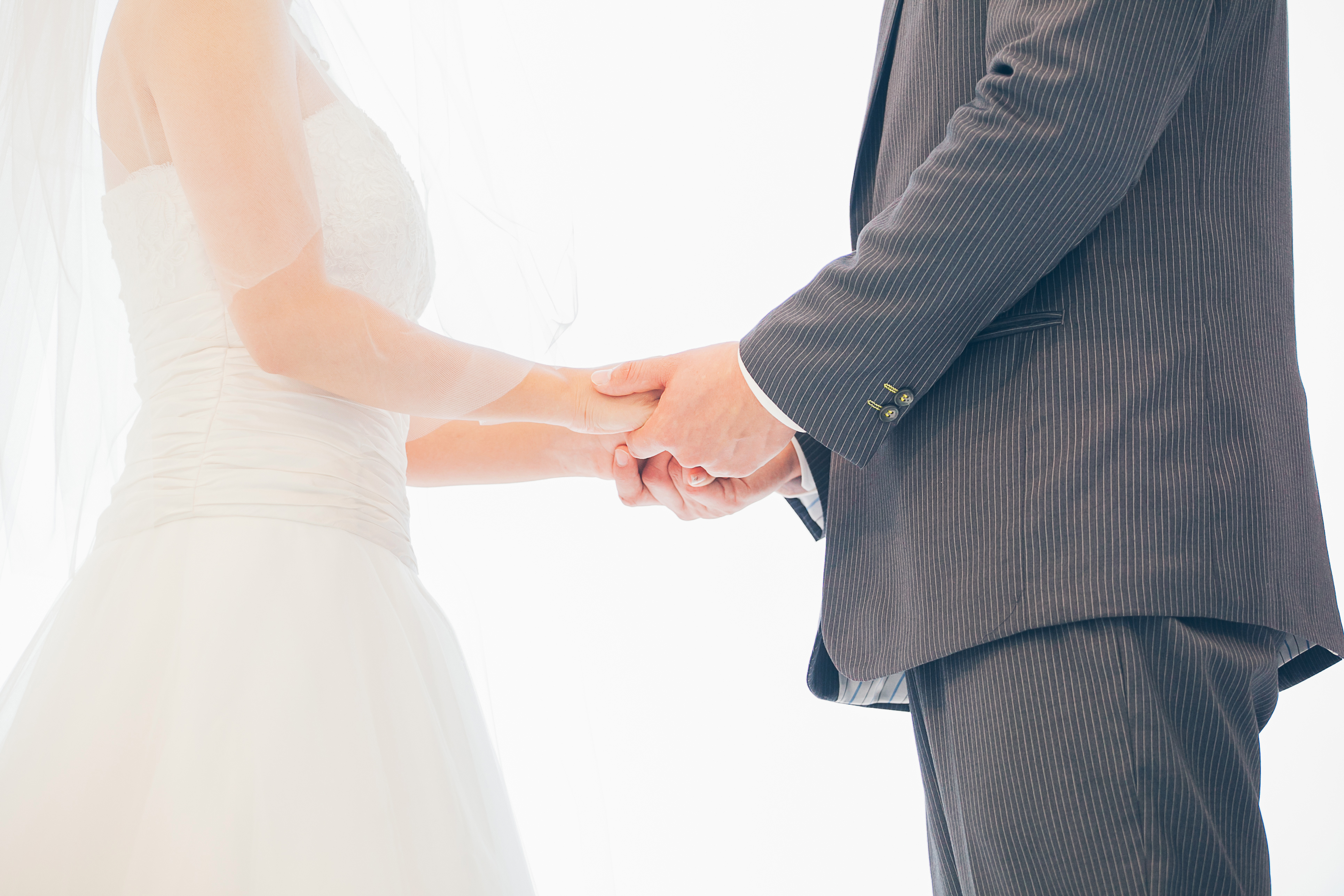 bridegroom and bride holding hand in wedding party