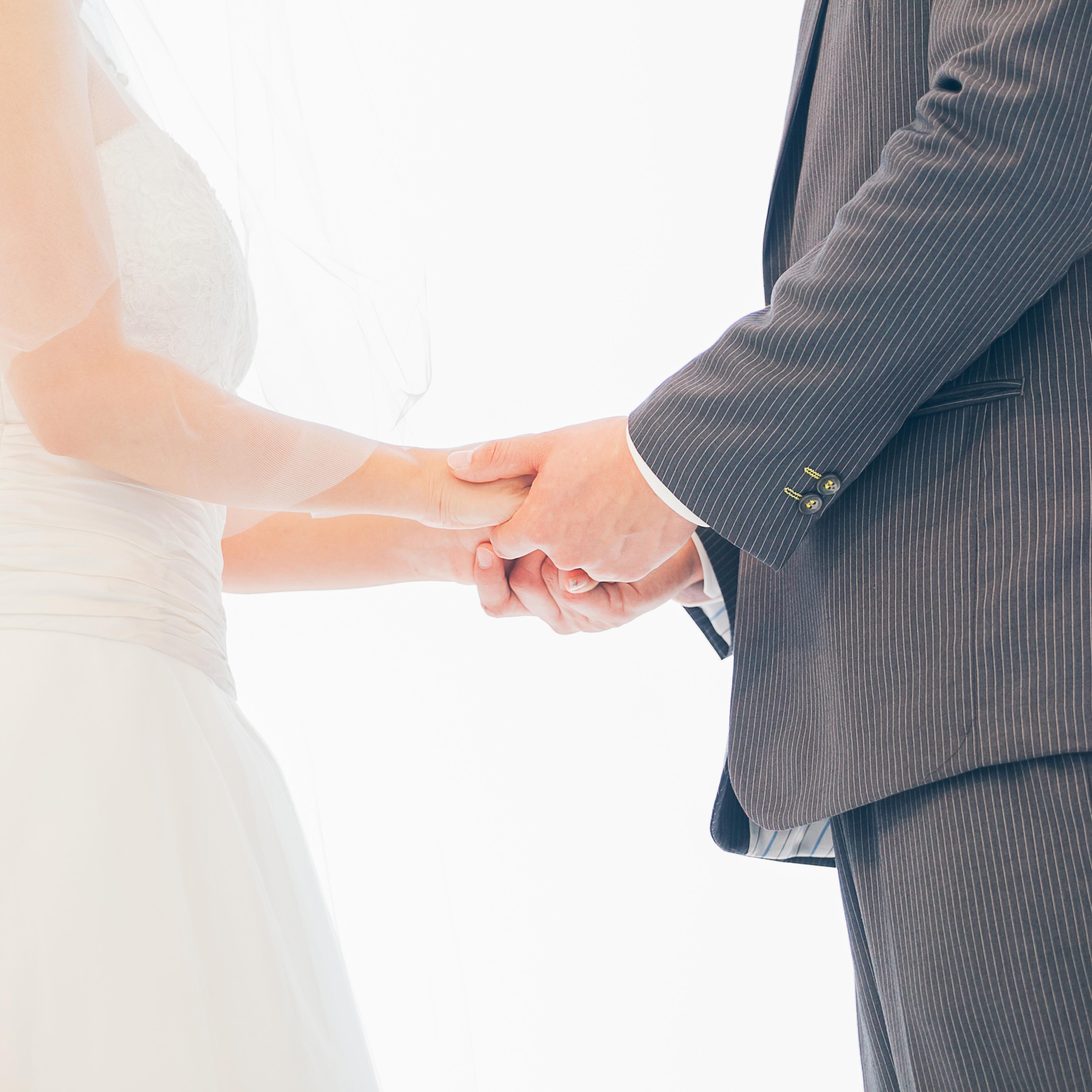 bridegroom and bride holding hand in wedding party
