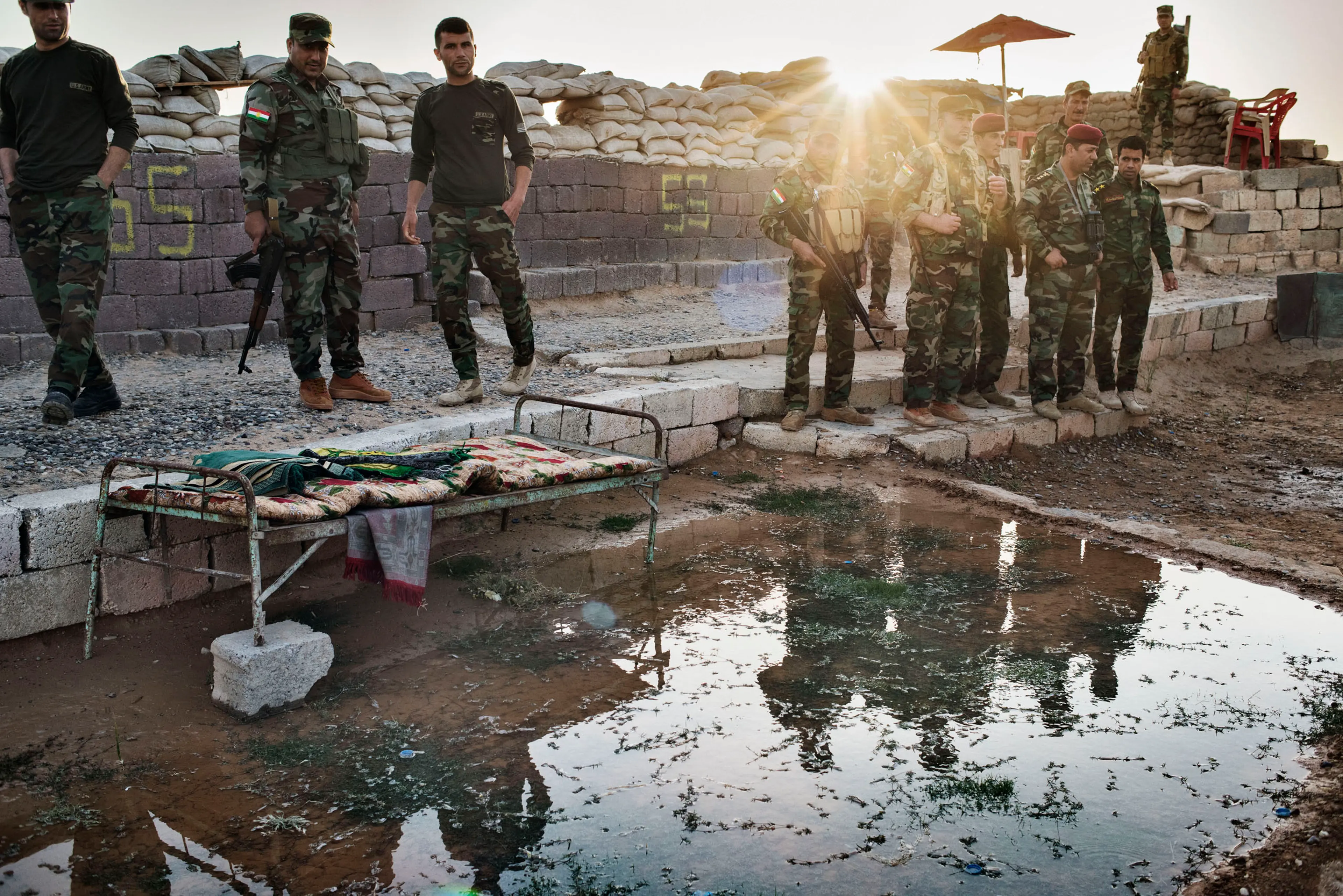 Kurdish Peshmerga at a small outpost near Makhmour, Kurdistan, northern Iraq, May 8, 2016. These fighters, many armed only with Russian AKs, blocked the ISIS advance into Kurdistan in 2014 after tens of thousands in the Iraqi Army that were trained and e