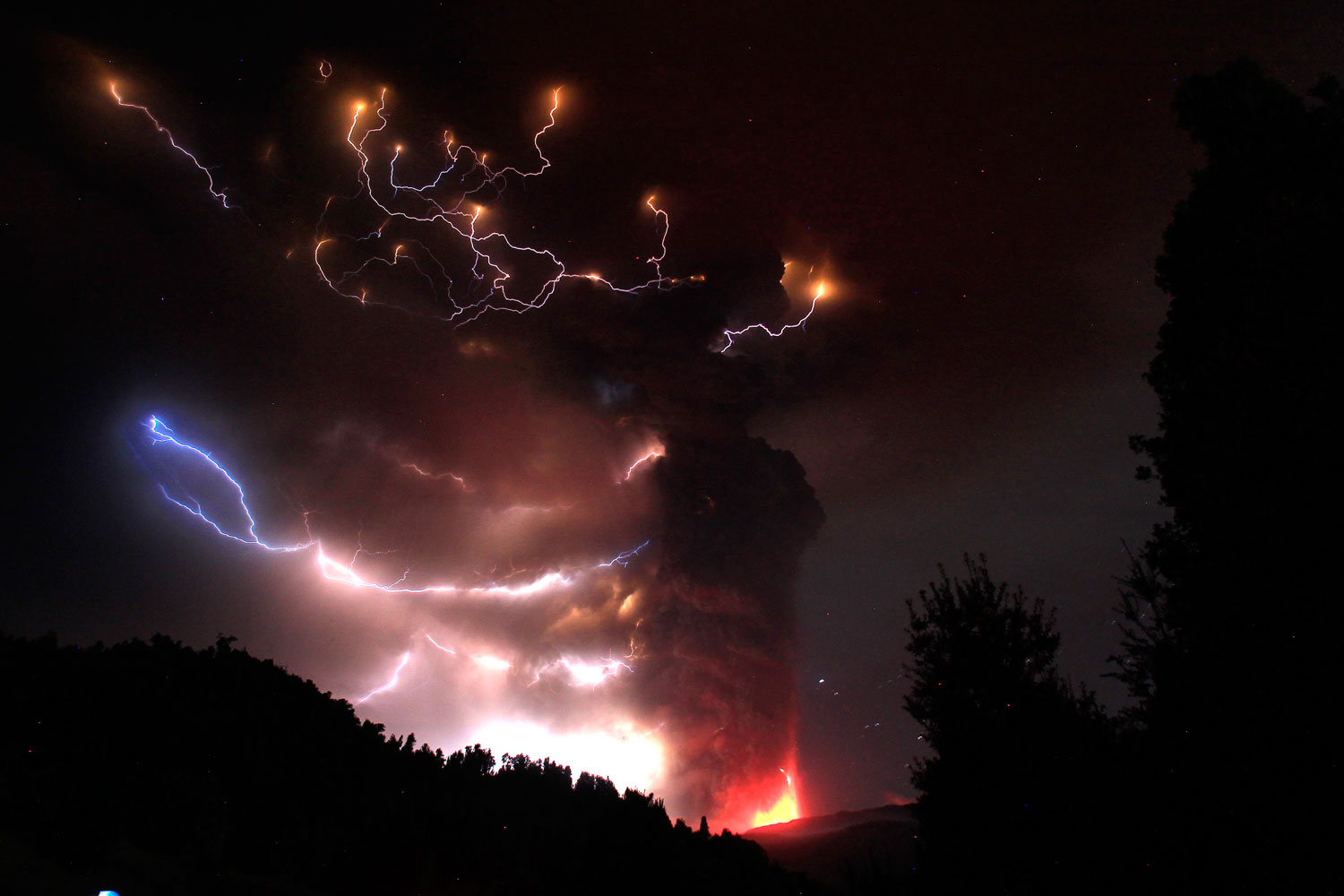 Lightning bolts strike around the Puyehue-Cordon Caulle volcanic chain near the southern city of Osorno on June 5, 2011. 