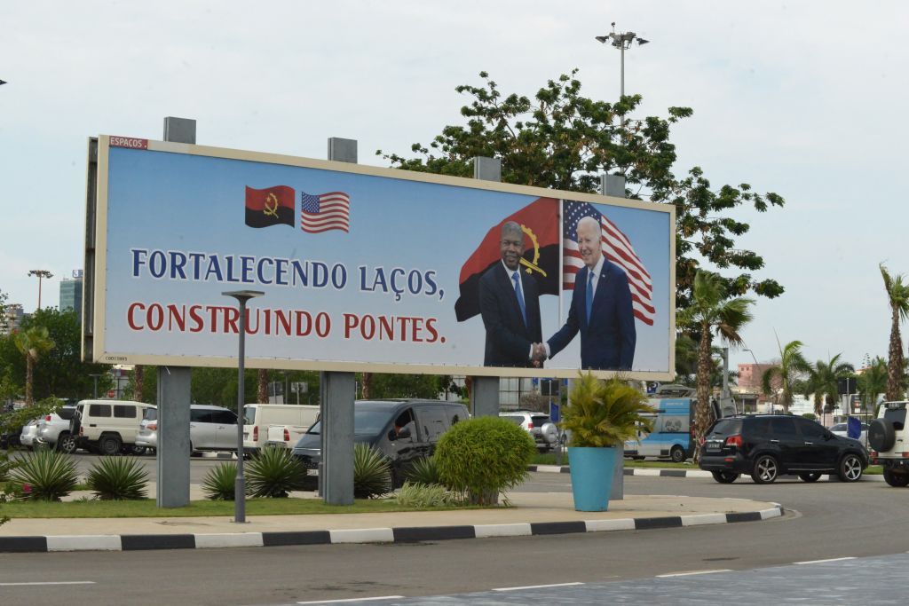 A poster showing a picture of Angola President João Lourenço shaking hands with U.S. President Joe Biden