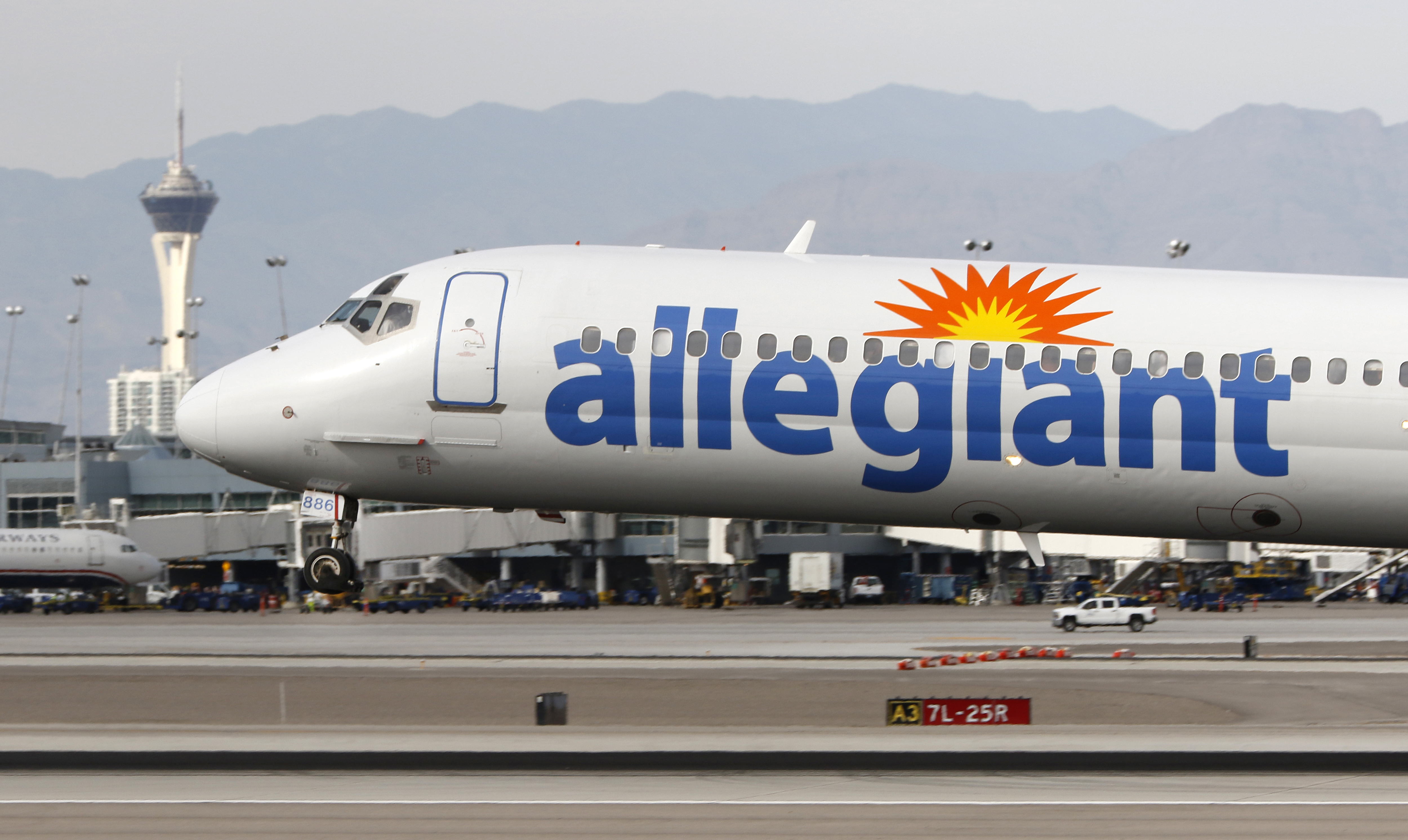 An Allegiant Air plane lands at McCarran International Airport in Las Vegas on March 3, 2016.