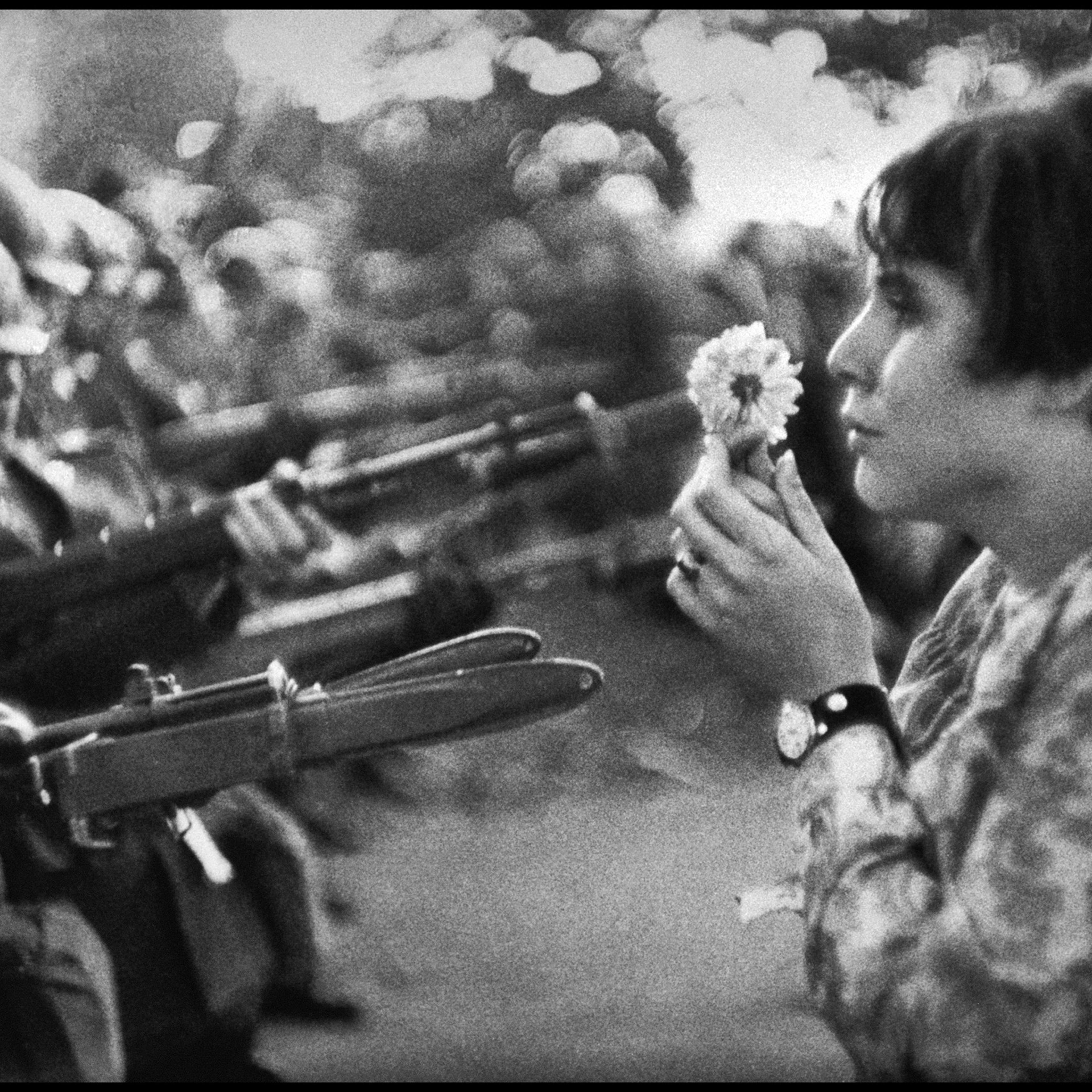 Jan Rose Kasmir, confronts the American National Guard outside the Pentagon during the 1967 anti-Vietnam march. This march helped to turn public opinion against the US war in Vietnam.