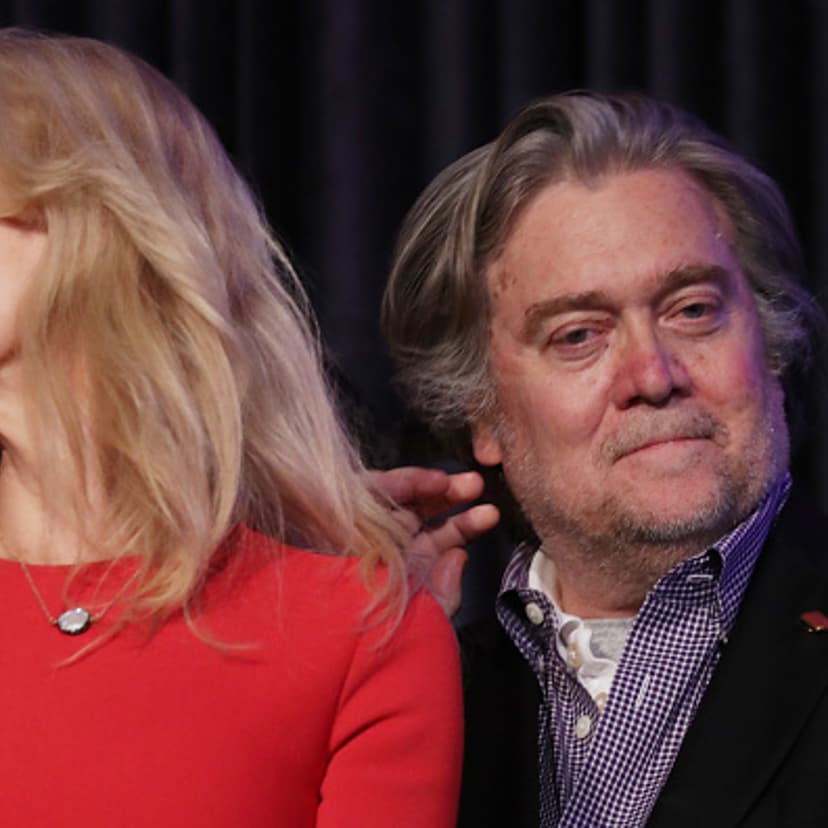 Republican president-elect Donald Trump's campaign manager, Kellyanne Conway, and Trump campaign CEO Stephen Bannon stand on stage during the election night event at the New York Hilton Midtown in the early morning hours of November 9, 2016 in New York C