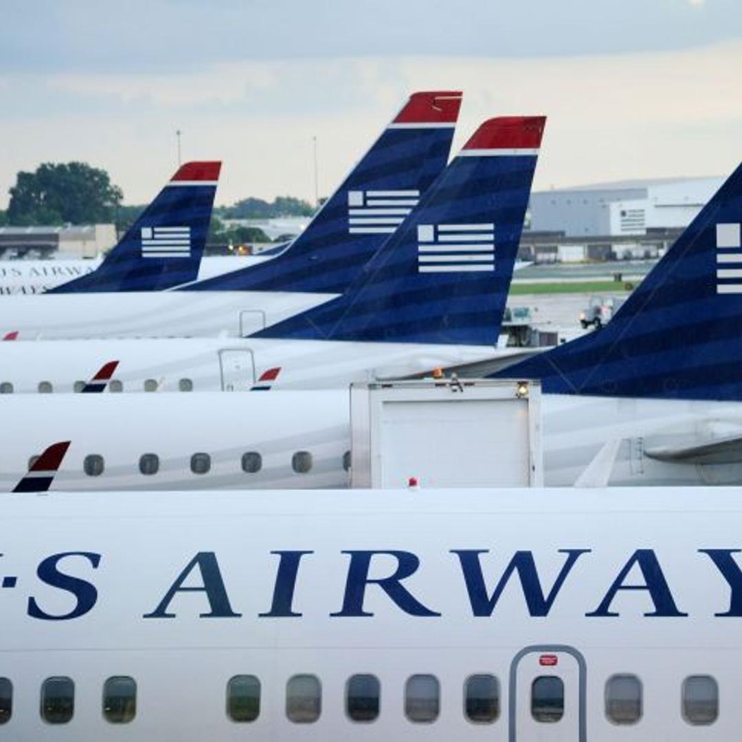 US Airways Begins Merger Talks With American Airlines