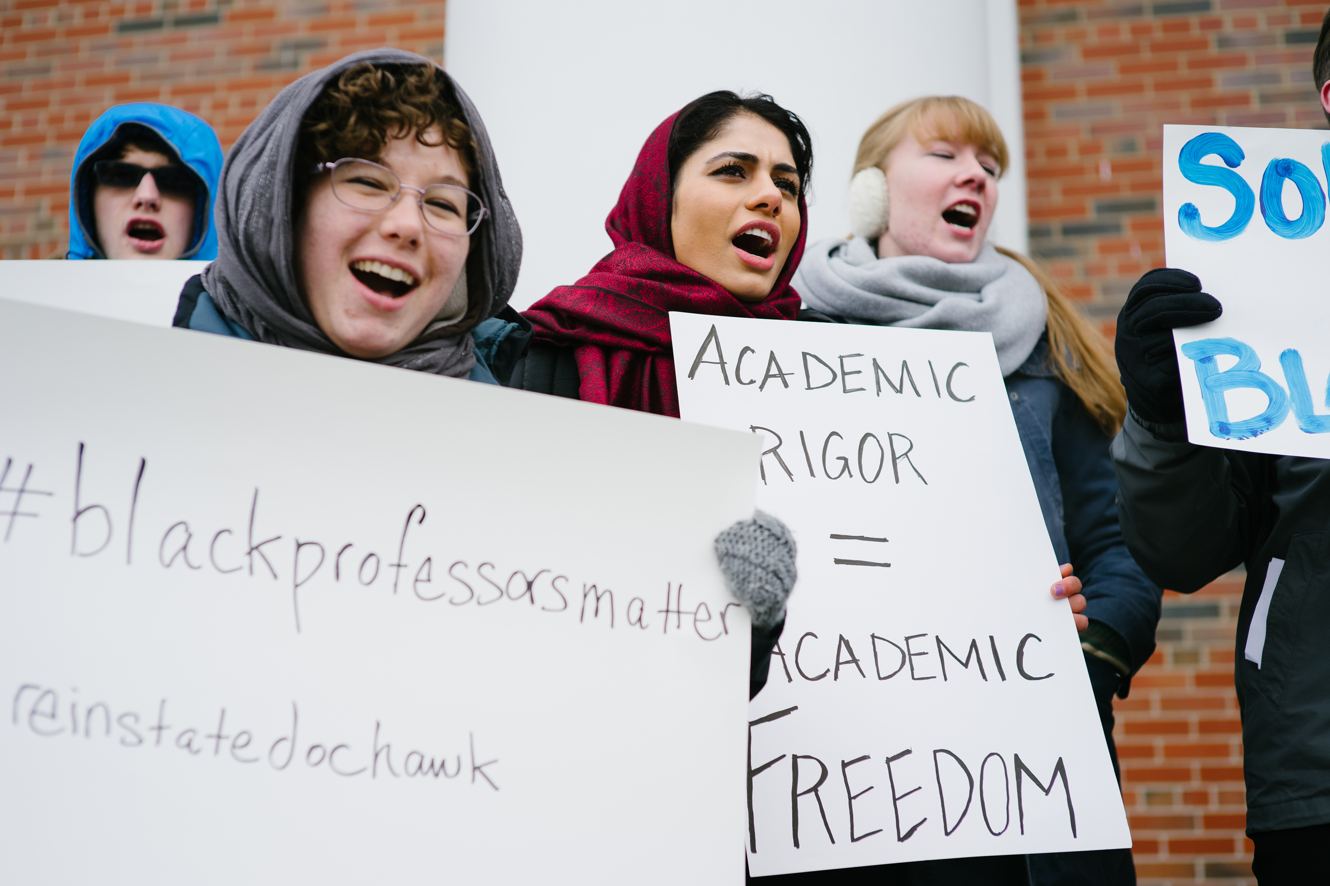 Maryam Bighash (C) participates in a show of support for Wheaton professor Larcyia Hawkins in front of Edman Chapel in Wheaton, Ill. on Jan. 11, 2016.