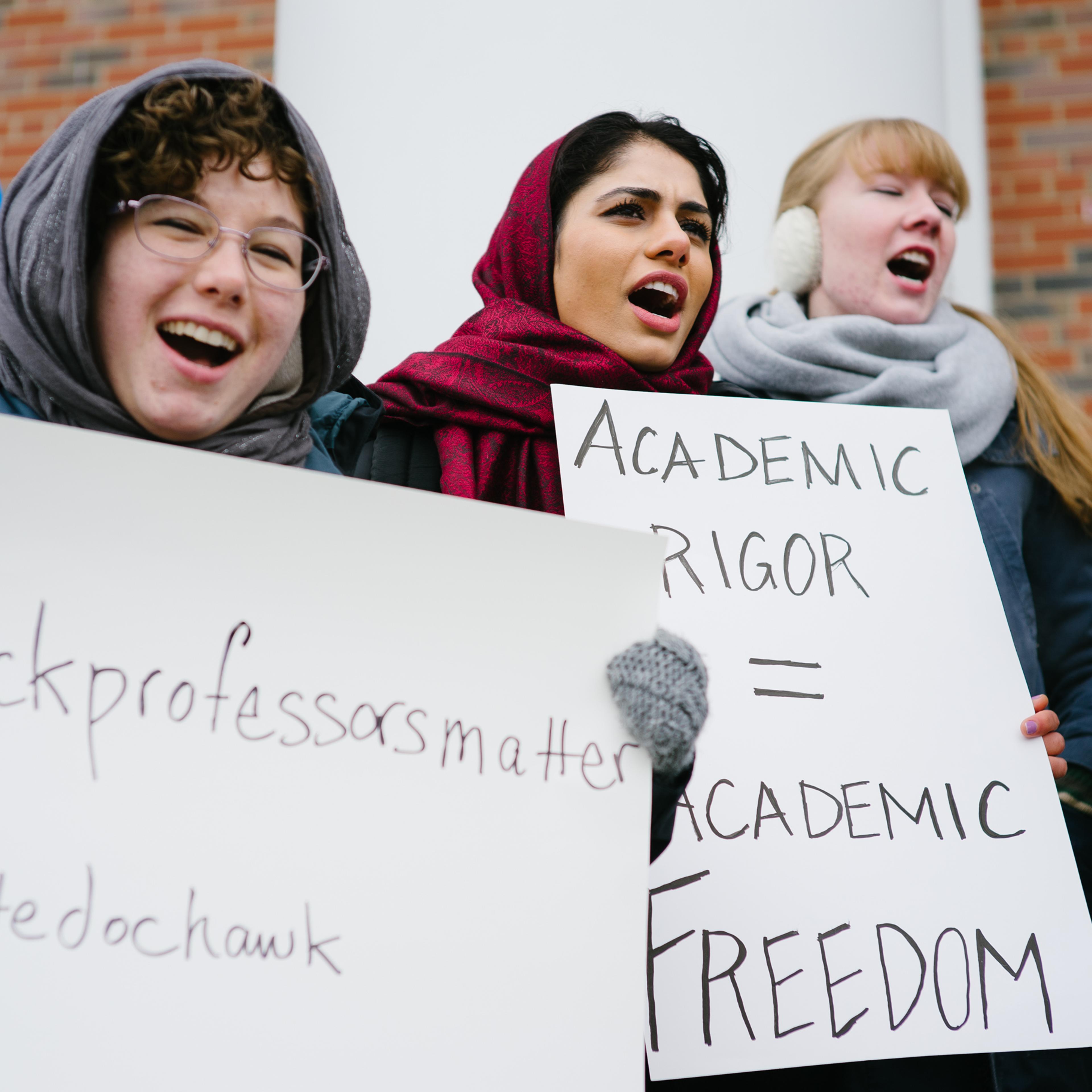 Maryam Bighash (C) participates in a show of support for Wheaton professor Larcyia Hawkins in front of Edman Chapel in Wheaton, Ill. on Jan. 11, 2016.