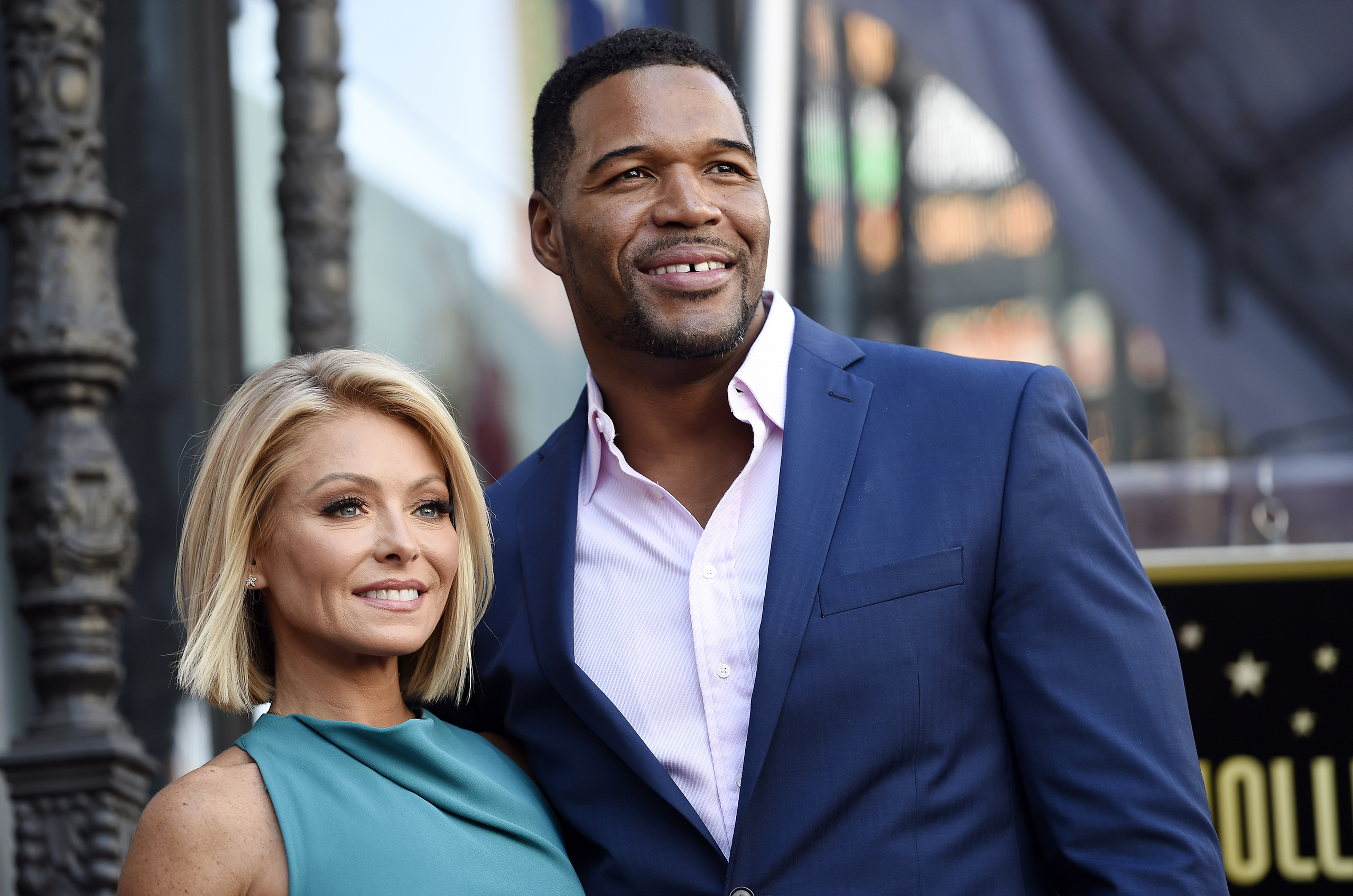 Kelly Ripa poses with Michael Strahan in Los Angeles, Oct. 12, 2015.