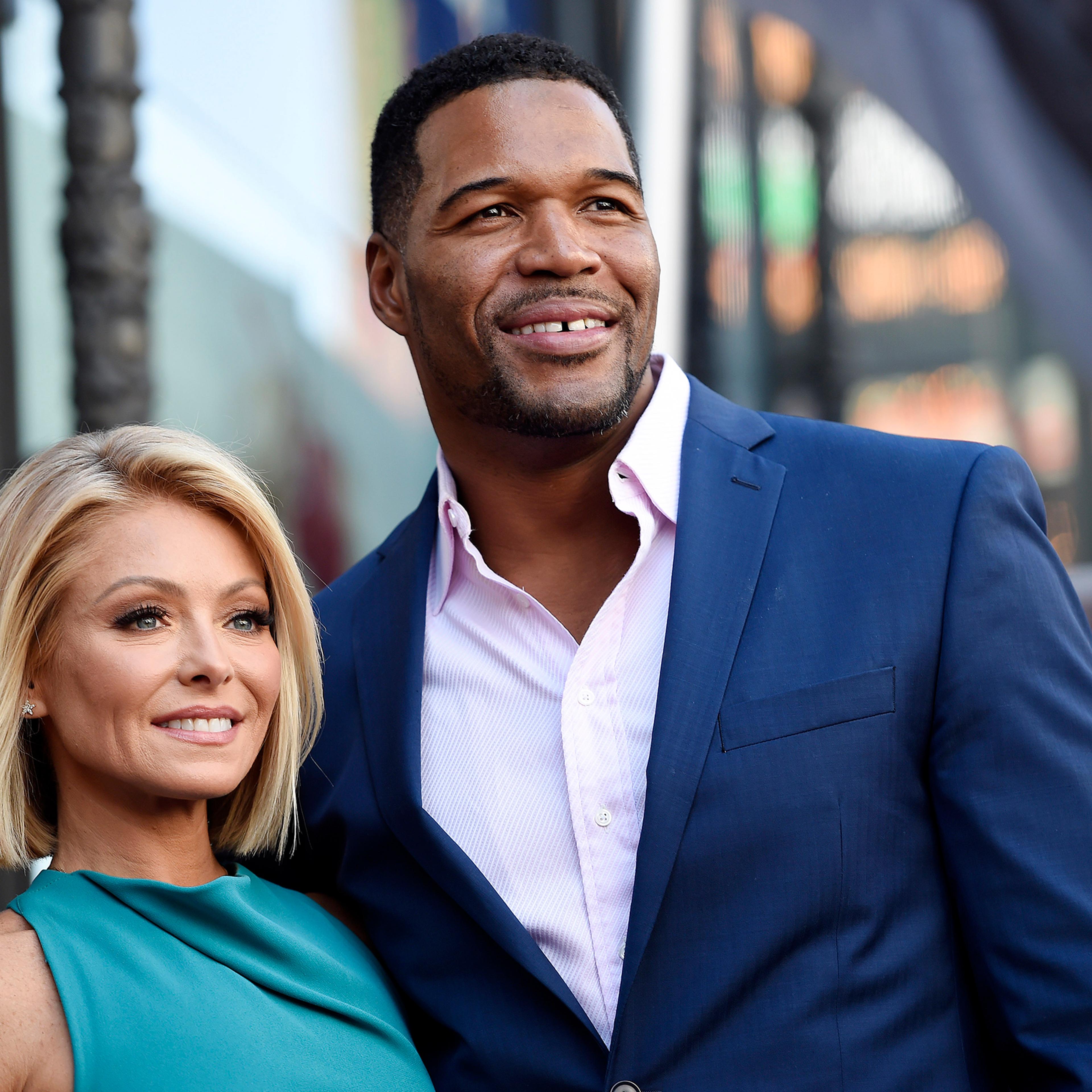Kelly Ripa poses with Michael Strahan in Los Angeles, Oct. 12, 2015.