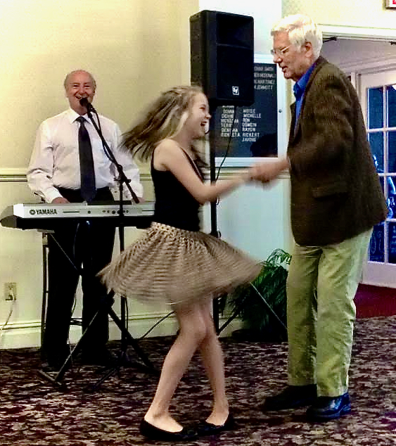 The author's father, Joe Schrobsdorff dancing with his granddaughter at an assisted-.living residence