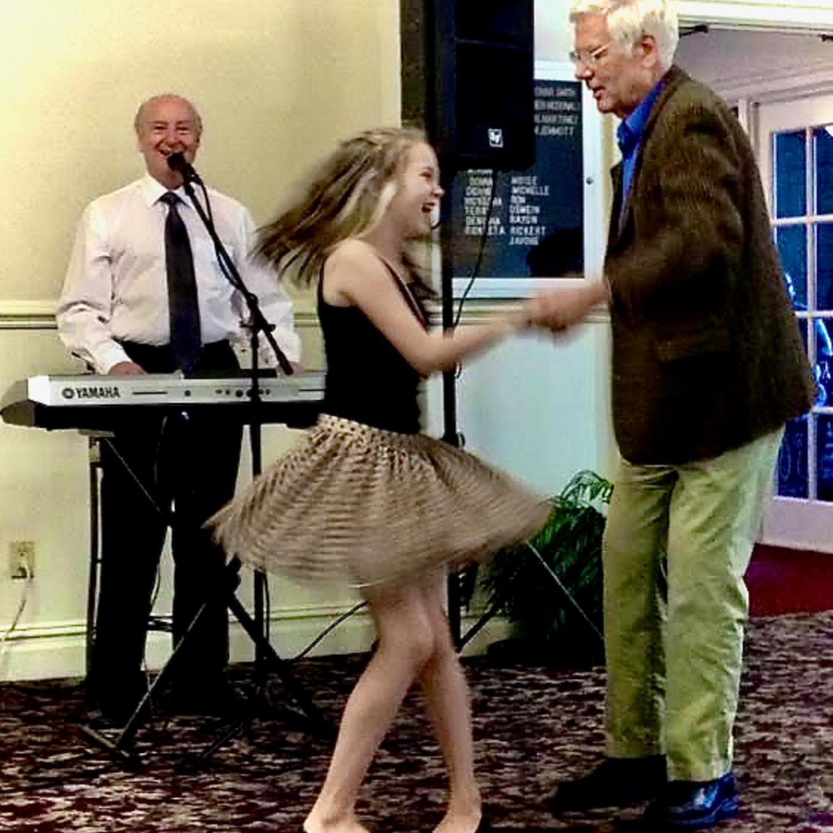 The author's father, Joe Schrobsdorff dancing with his granddaughter at an assisted-.living residence