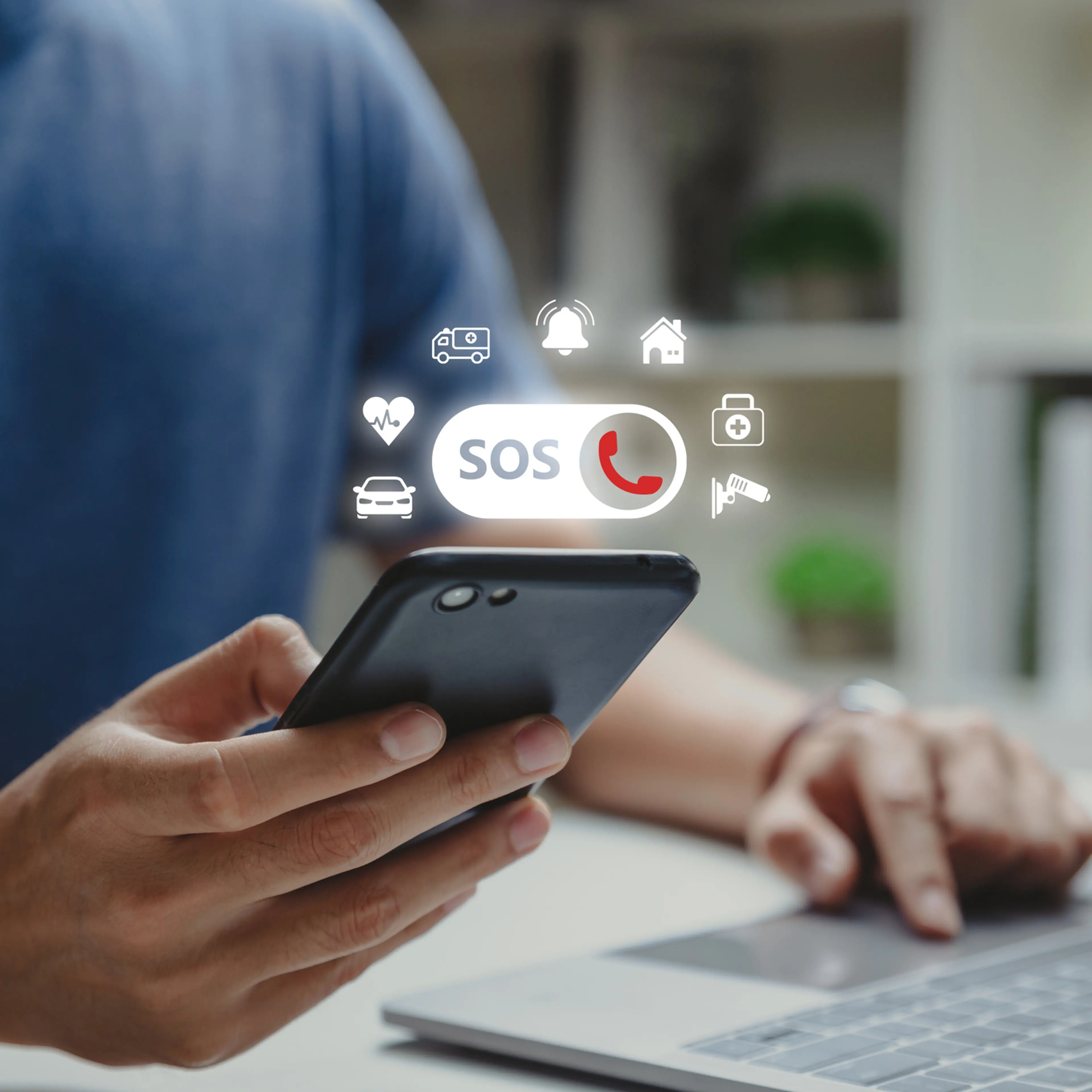 Man using Smart Phone with Emergency app.