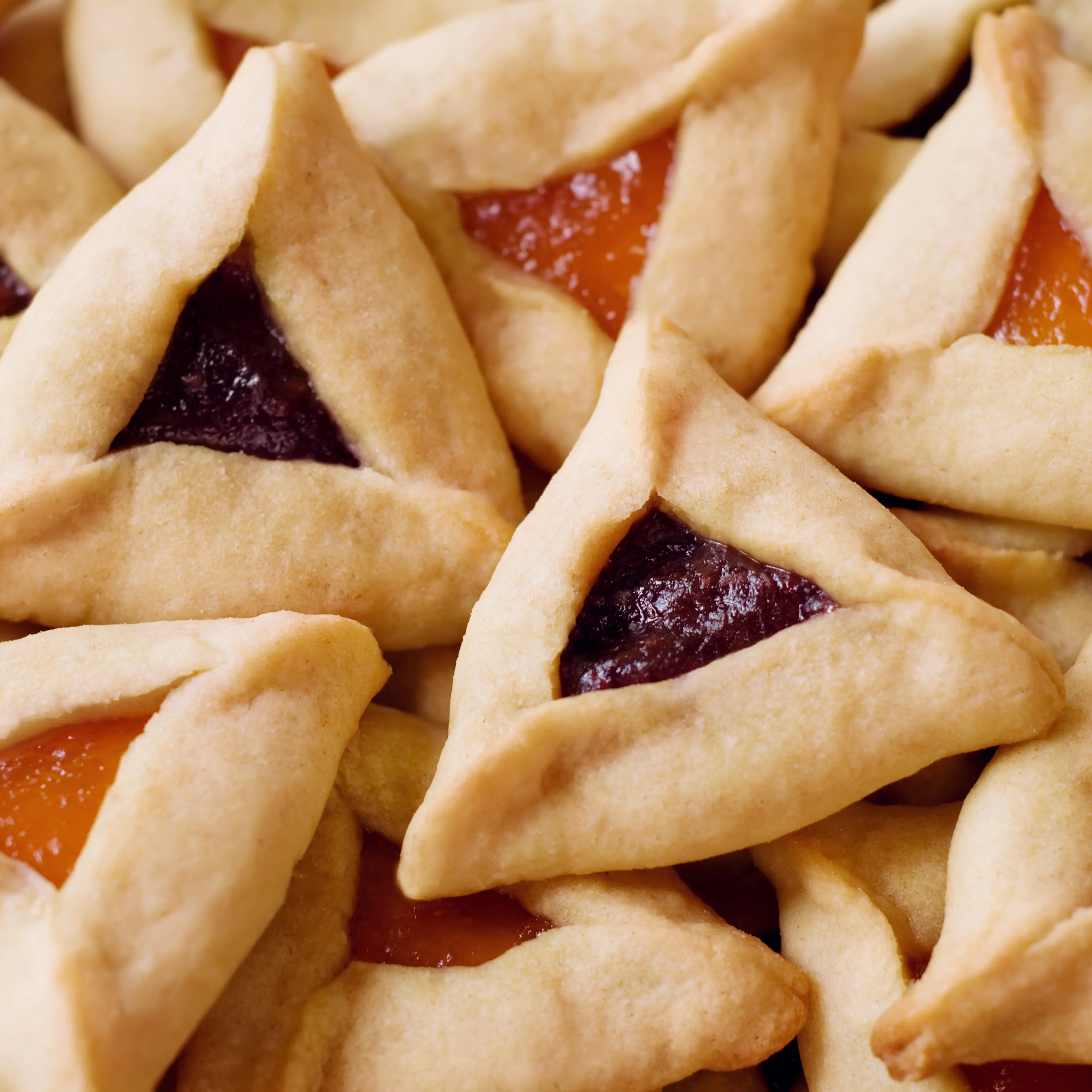 Close up of a pile of Hamantaschen Cookies