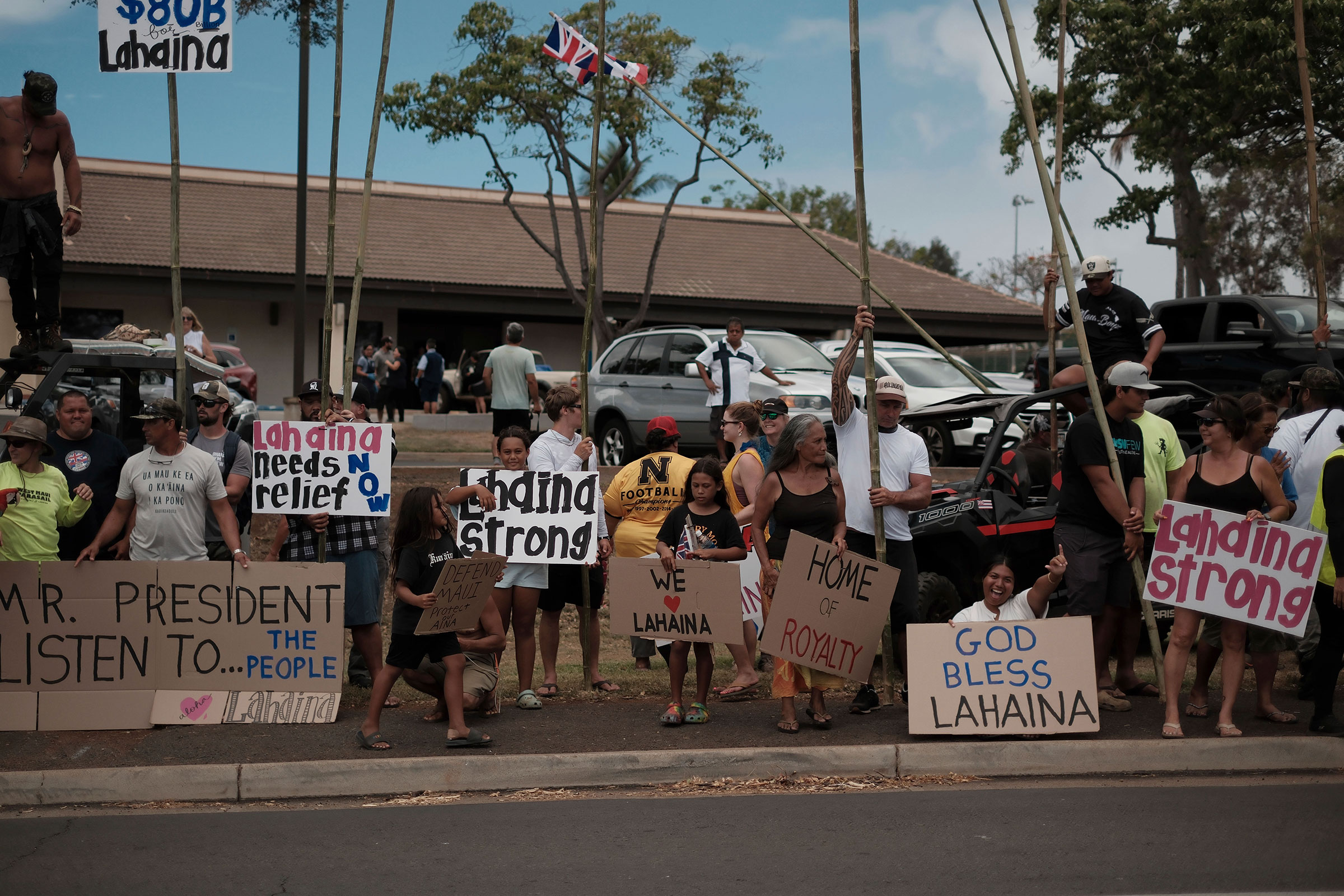 Local residents gather to welcome President Joe Biden in Lahaina on Aug. 21, 2023.