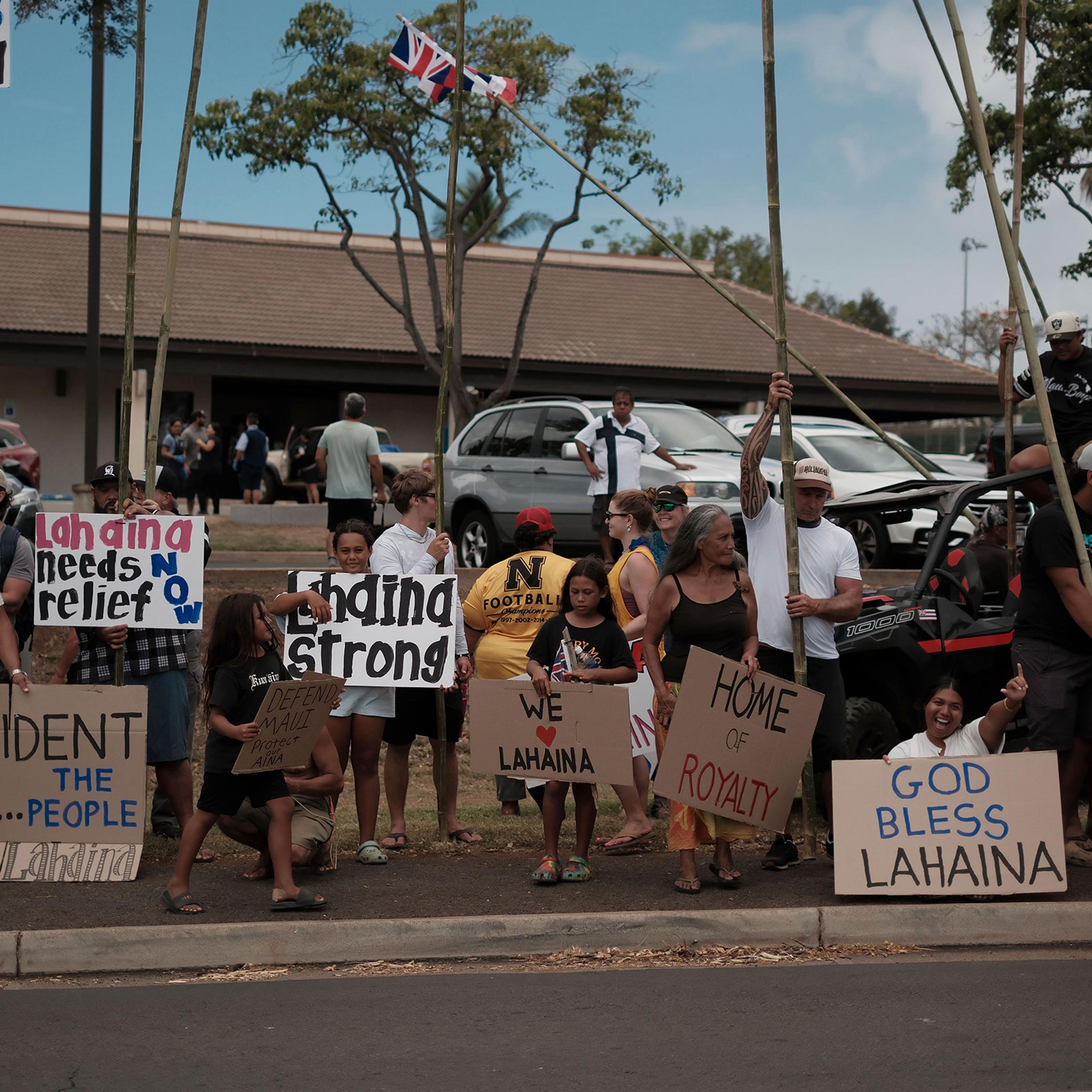 Local residents gather to welcome President Joe Biden in Lahaina on Aug. 21, 2023.
