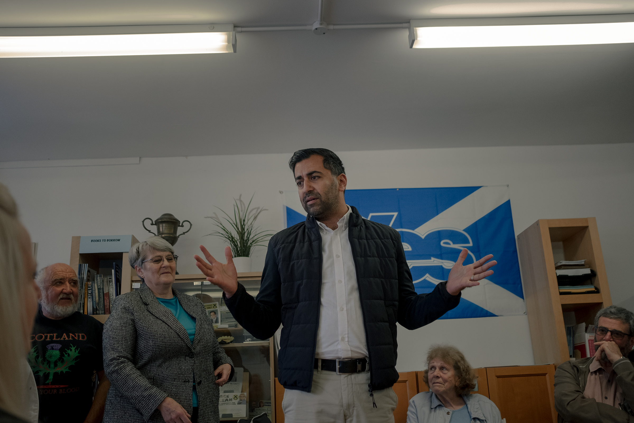 Yousaf speaks to supporters at the SNP office in Largs, Scotland, on Aug. 23.