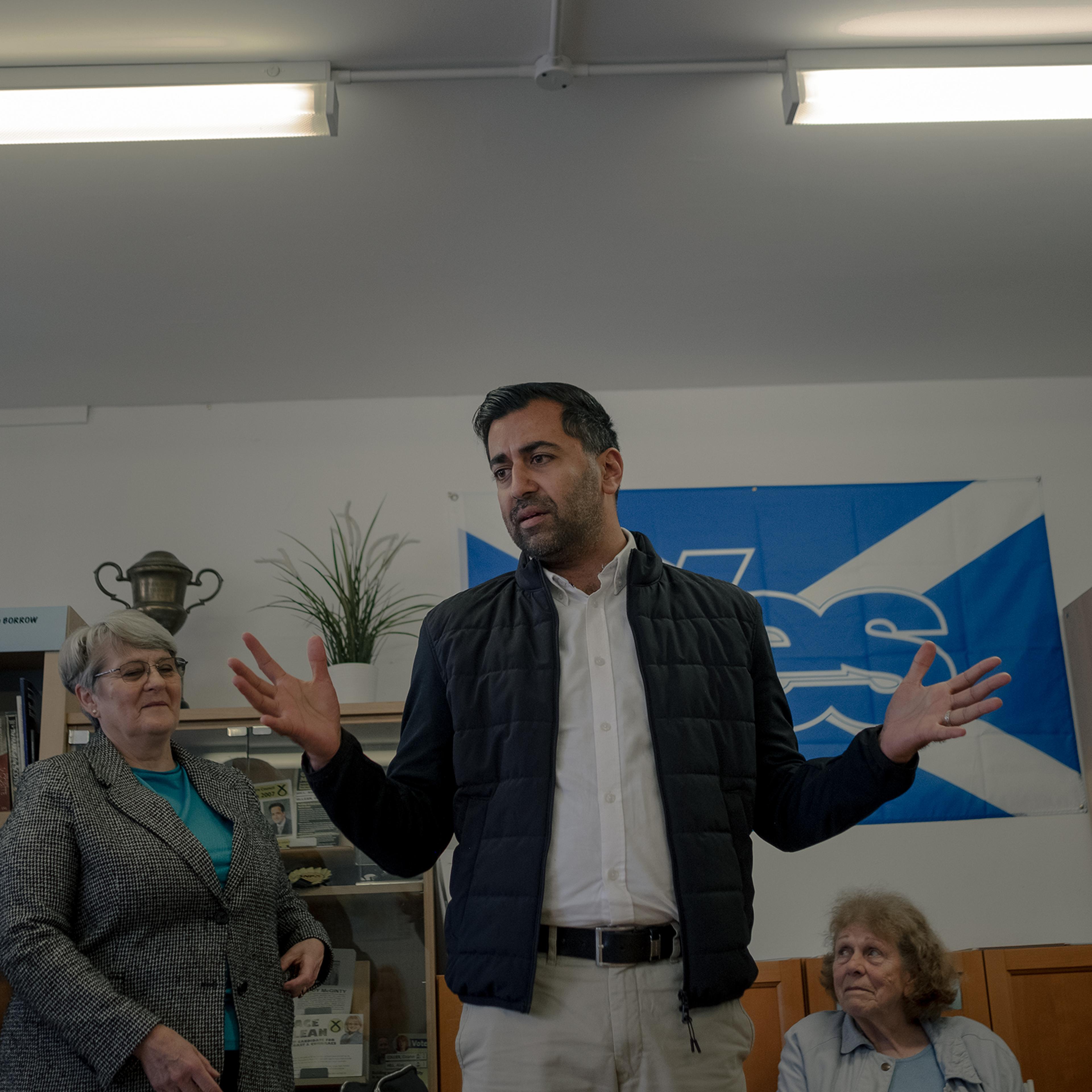 Yousaf speaks to supporters at the SNP office in Largs, Scotland, on Aug. 23.