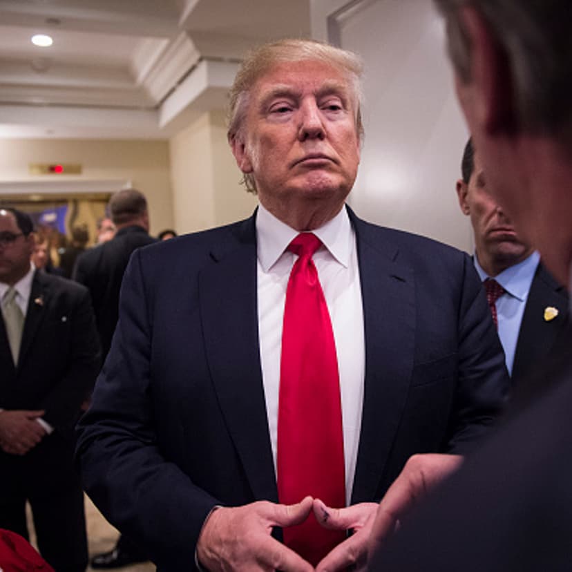 Republican presidential candidate Donald Trump stops to talk to a reporters as he makes his way through he crowd after speaking during a campaign press conference event at the Trump National Golf Club in Jupiter, FL on Tuesday March 08, 2016.