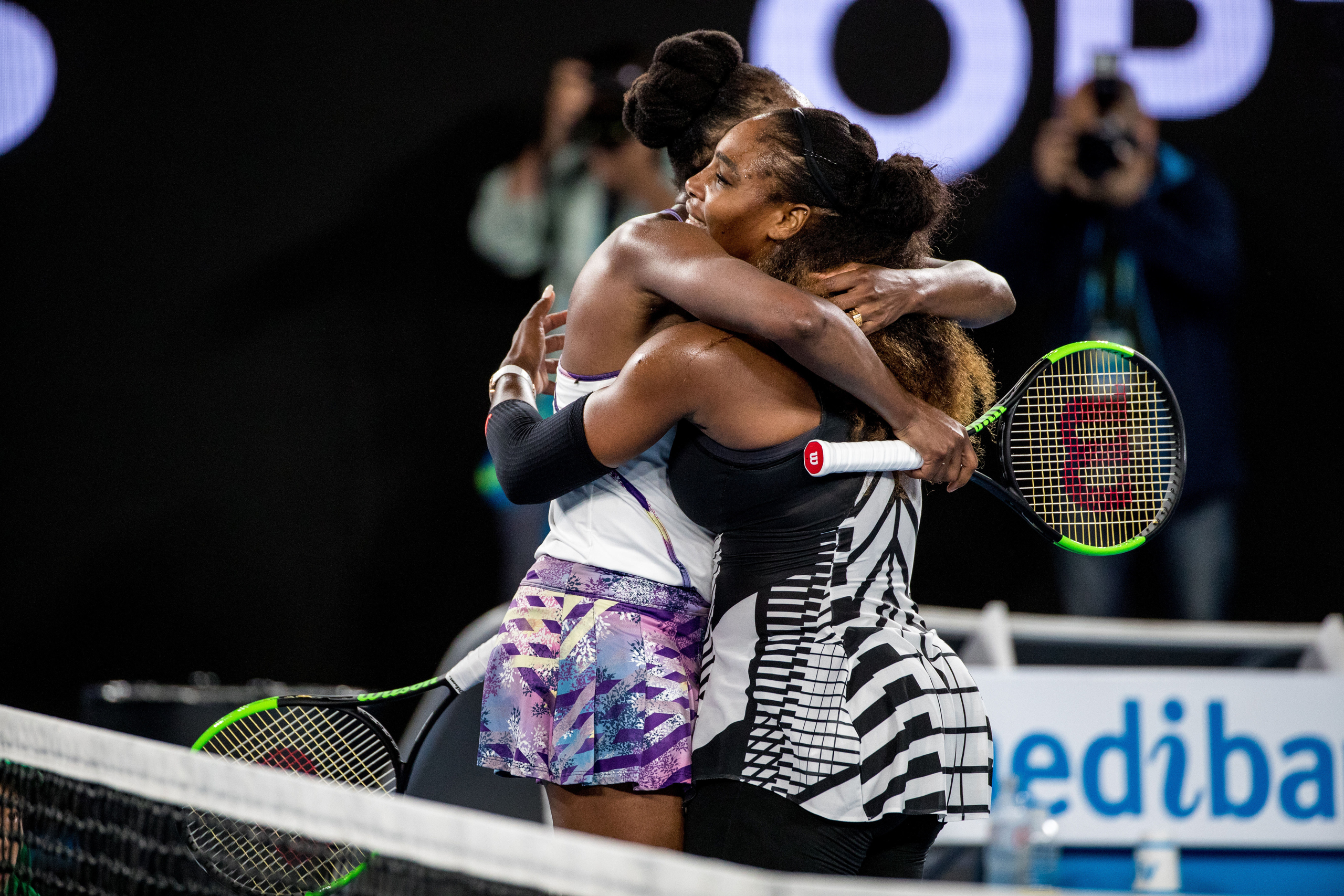 MELBOURNE, VIC - JANUARY 28: Venus Williams of the United States of America embraces her sister Serena Williams of the United States of America in congratulations for her winning the Womens Singles Final of the 2017 Australian Open on January 28, 2017, a