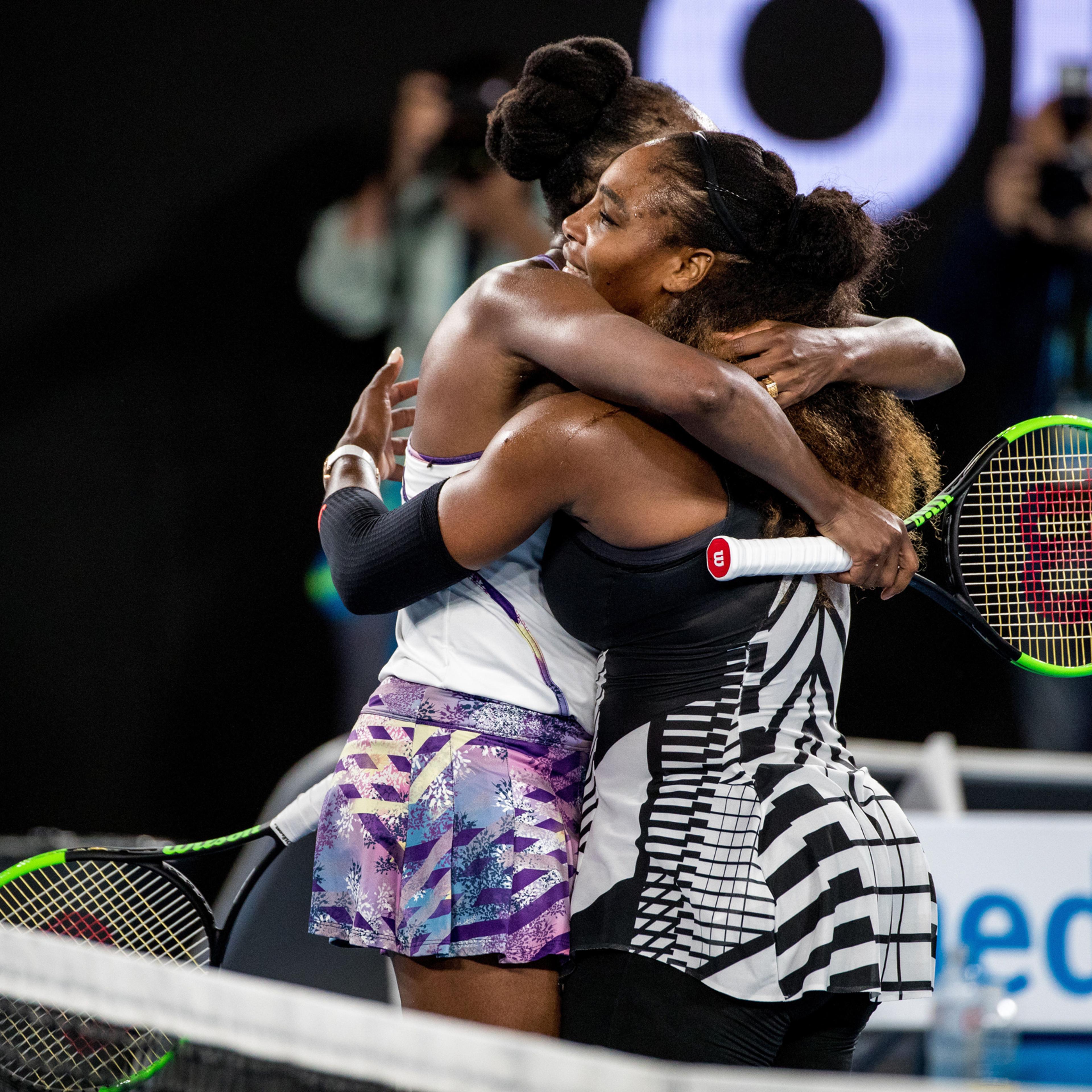 MELBOURNE, VIC - JANUARY 28: Venus Williams of the United States of America embraces her sister Serena Williams of the United States of America in congratulations for her winning the Womens Singles Final of the 2017 Australian Open on January 28, 2017, a