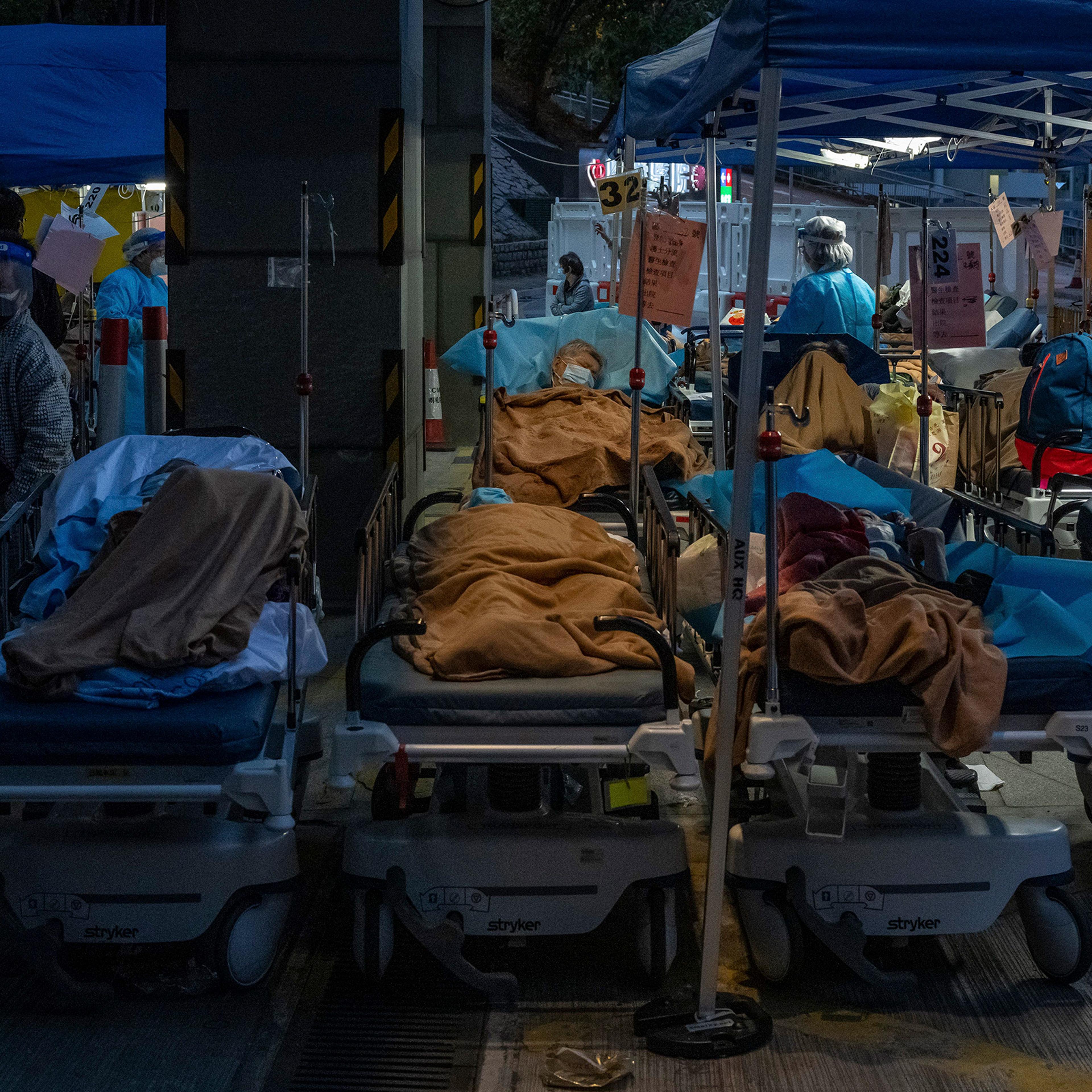 Patients are treated at a makeshift area outside Caritas Medical Center in Hong Kong, March 2
