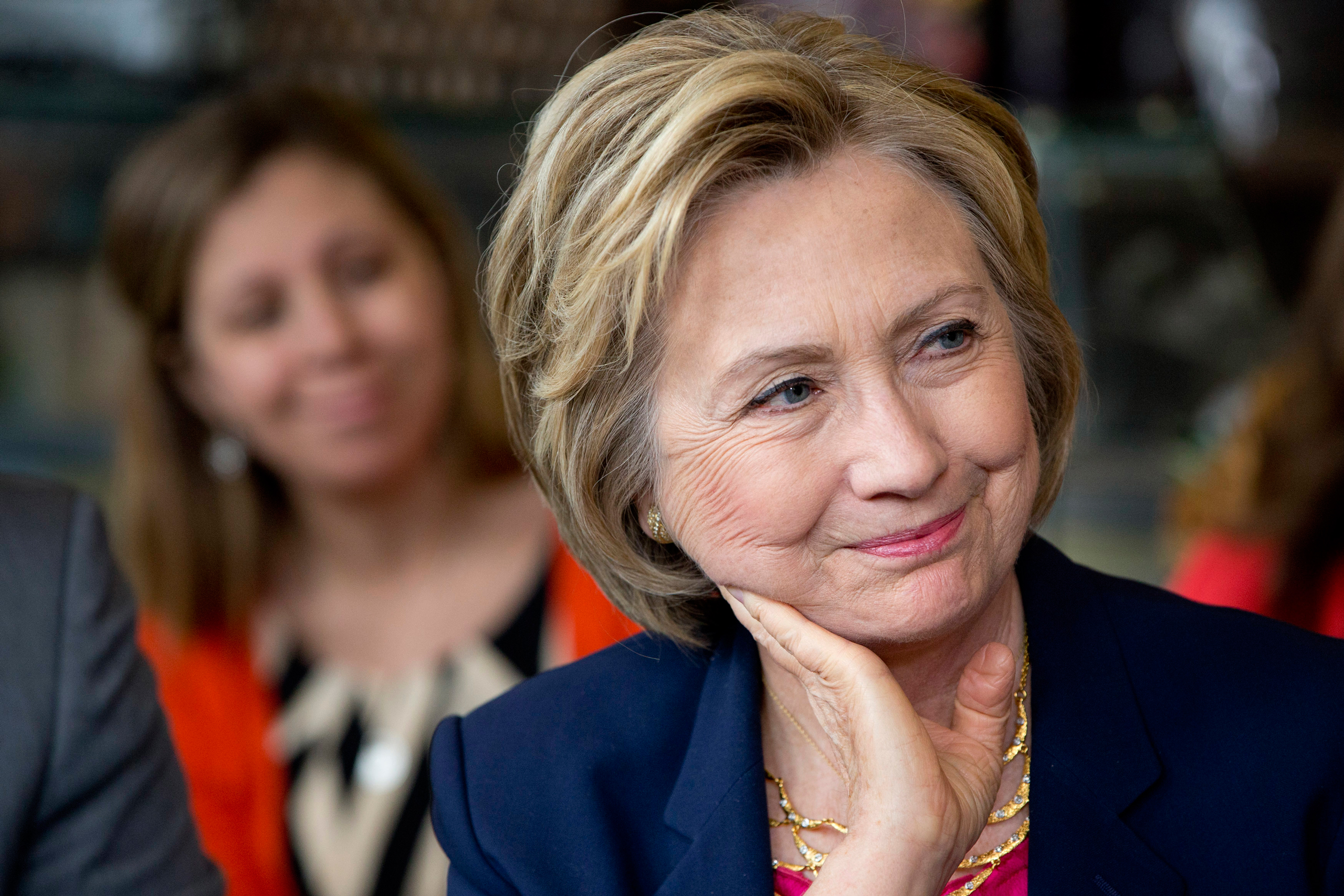 Democratic Presidential Candidate Hillary Clinton listens to questions from parents of young children at Mug'N Muffin in Stone Ridge, Va., Monday, May 9, 2016. (AP Photo/Jacquelyn Martin)
