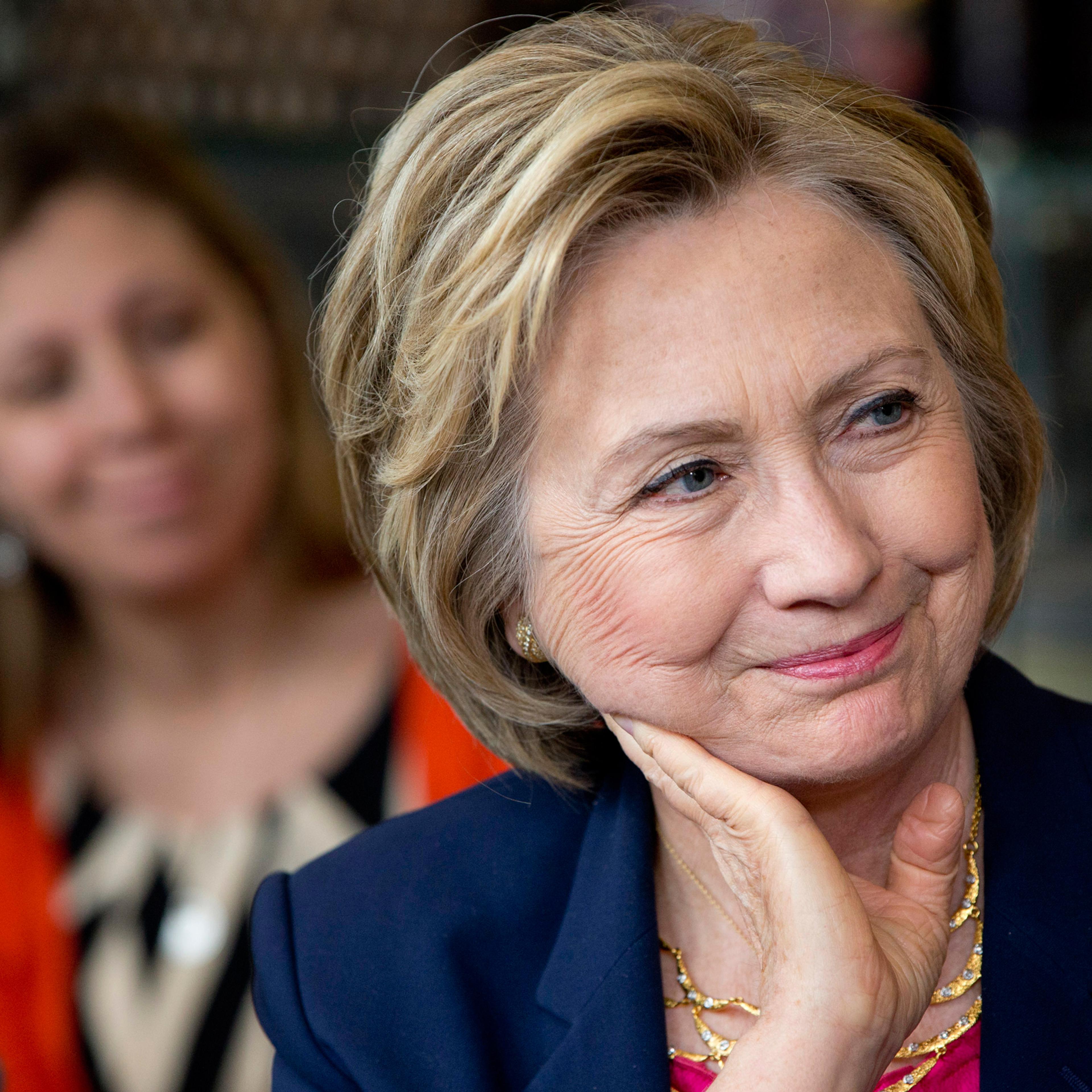 Democratic Presidential Candidate Hillary Clinton listens to questions from parents of young children at Mug'N Muffin in Stone Ridge, Va., Monday, May 9, 2016. (AP Photo/Jacquelyn Martin)