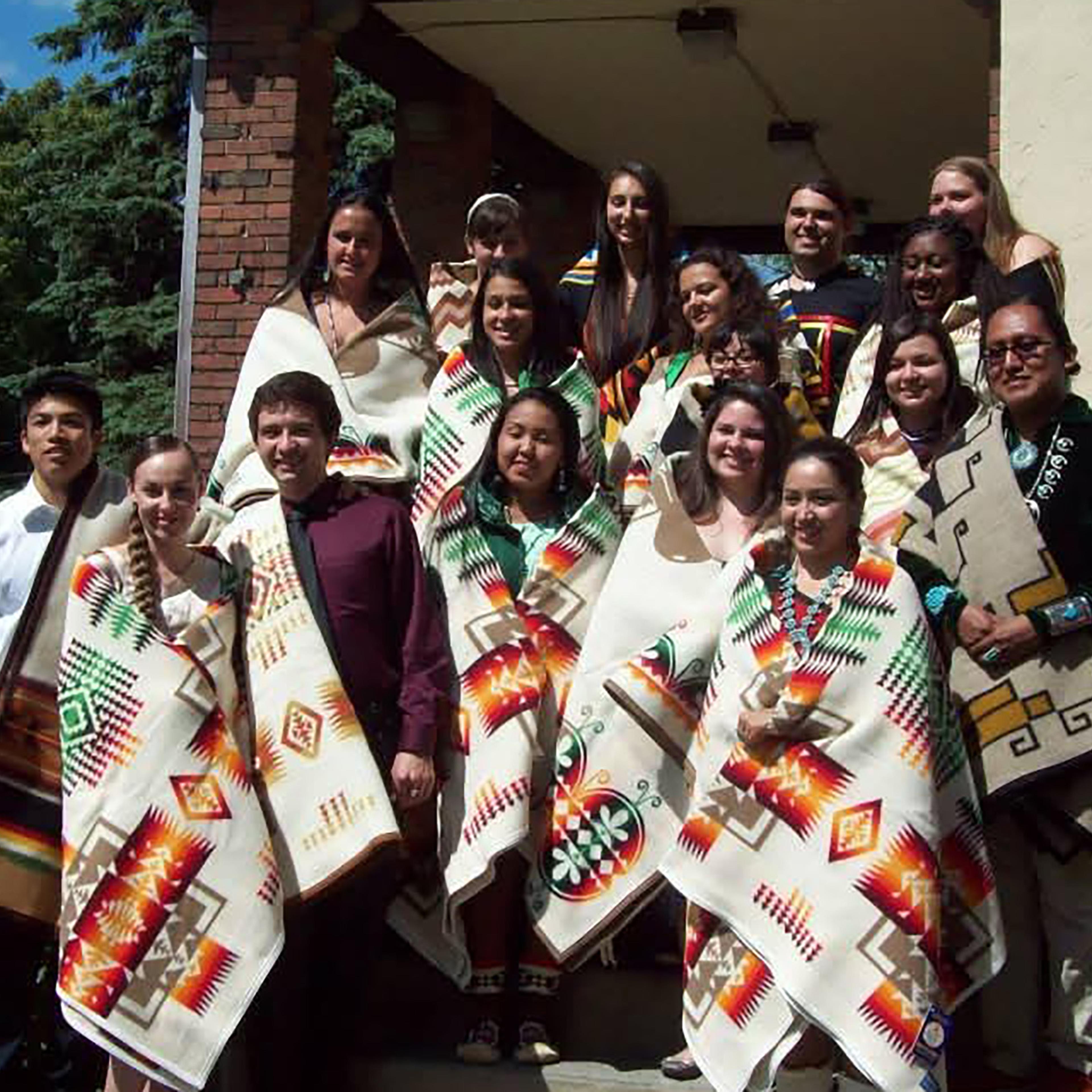 Graduating Native students outside of the Native American House at Dartmouth College, June 2013.