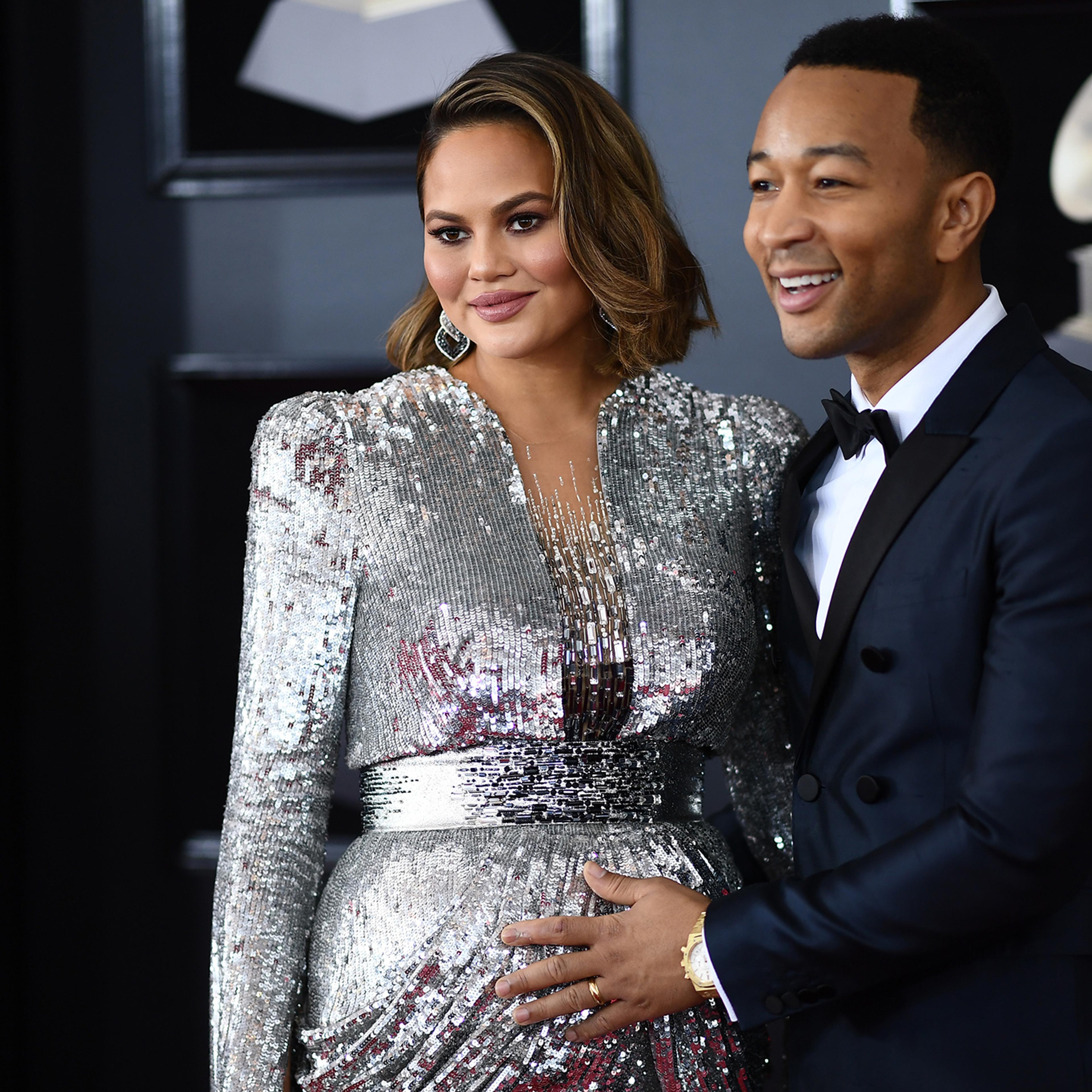 John Legend and Chrissy Teigen arrive for the 60th Grammy Awards on Jan. 28, 2018, in New York.